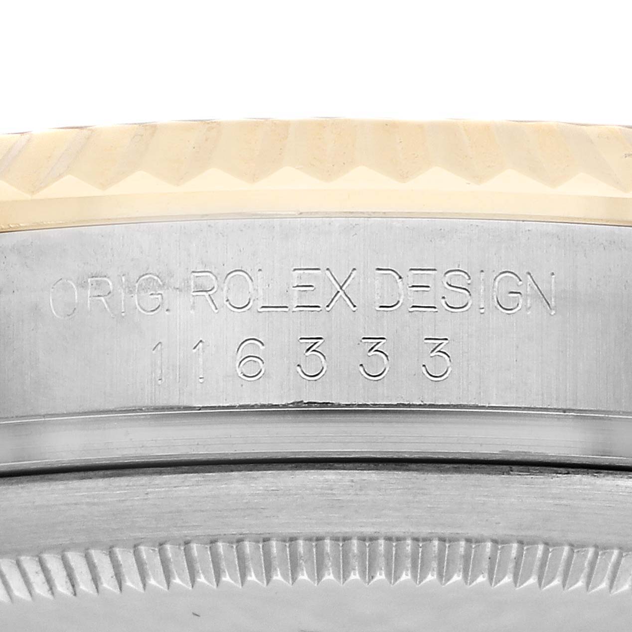 The image shows the side view of the Rolex Datejust 41 116333 Men's Steel and Gold (two tone) Champagne Dial, focusing on the engraved case with "ORIG. ROLEX DESIGN" and numbers.