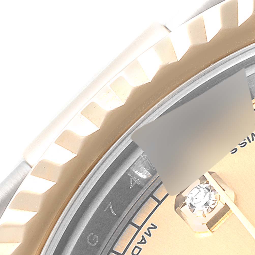 This close-up image shows part of the bezel and dial of the Rolex Datejust 41 116333 Men's Steel and Gold (two tone) Champagne Dial 116333 Men's Steel and Gold (two tone) Champagne Dial watch.
