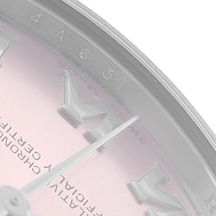 The image shows a close-up of the Rolex Mid-Size 178240 Women's Stainless Steel Pink Dial model's dial, highlighting the Roman numerals, hands, and edge of the bezel.