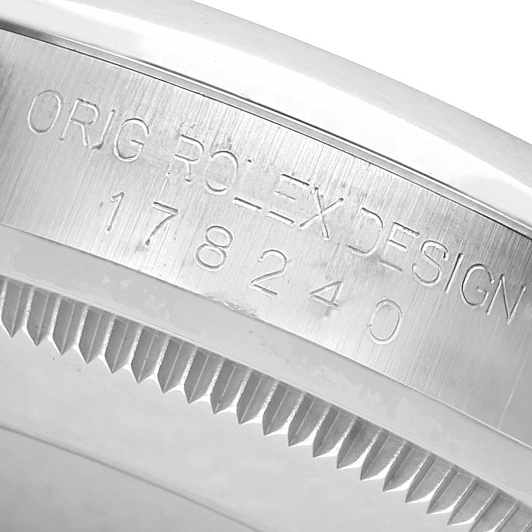 The image shows a close-up of the case edge of the Mid-Size Rolex watch, featuring the design engraving with model number 178240.