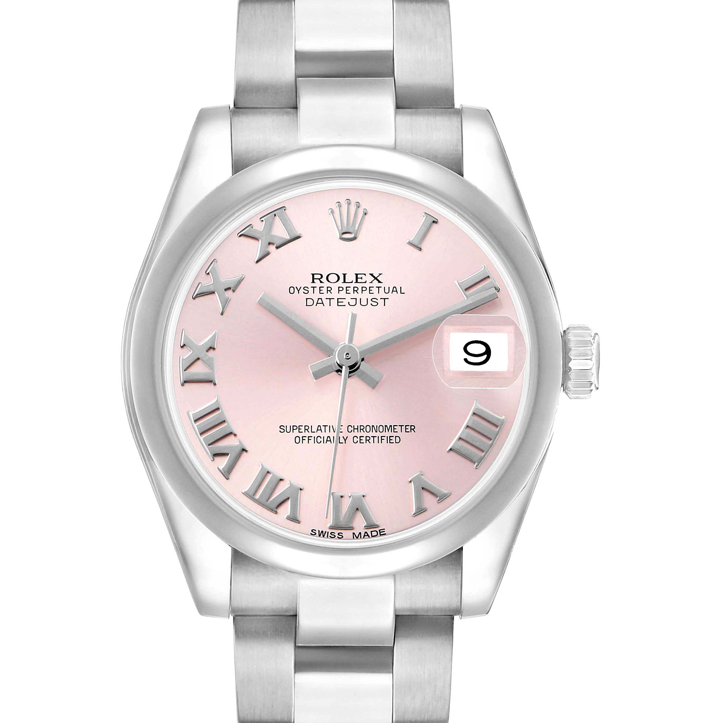The Rolex Datejust Mid-Size watch is shown from a top view, displaying the pink dial, Roman numerals, date window, and bracelet.