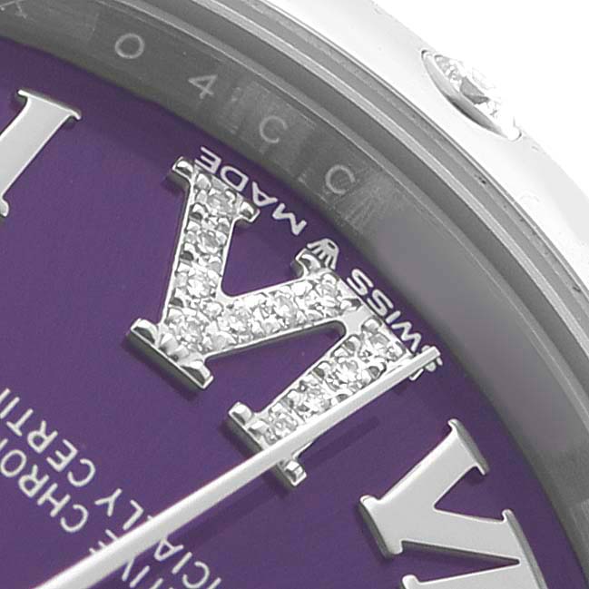 The image shows a close-up of the dial and bezel edge of a Rolex Mid-Size 278344 Women's Stainless Steel Purple Dial model, highlighting the "SWISS MADE" text.