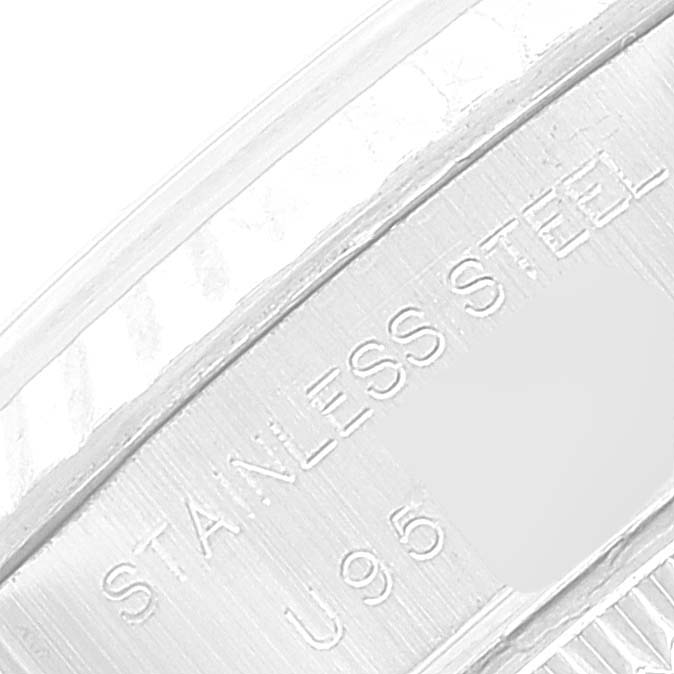 This close-up image shows the engraving on the side of a stainless steel Rolex Datejust 69174 Women's Stainless Steel Silver Dial 69174 Women's Stainless Steel Silver Dial watch case.