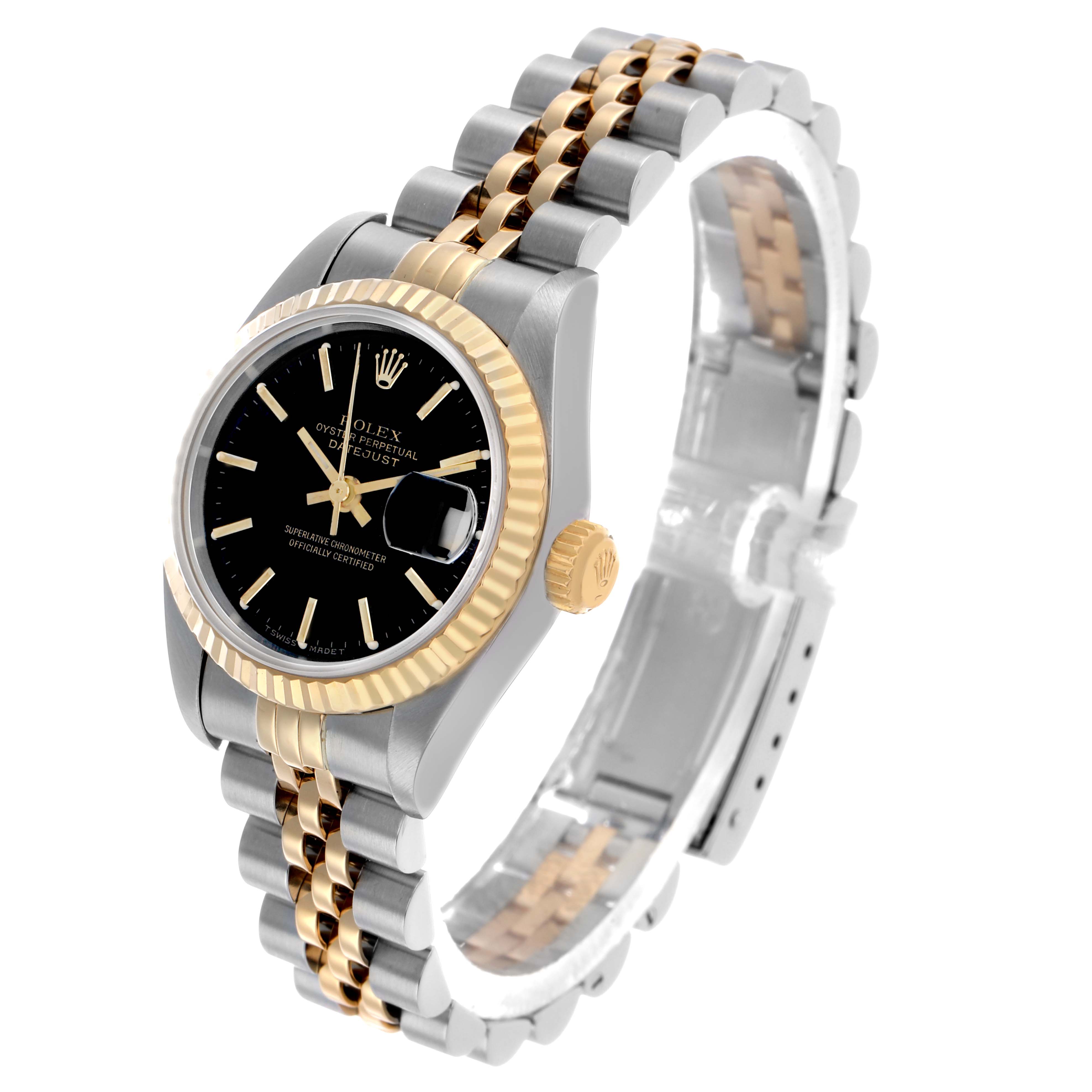 The Rolex Datejust 69173 Women's Steel and Gold (two tone) Black Dial watch is shown at an oblique angle, displaying the face, bezel, crown, and two-tone bracelet.