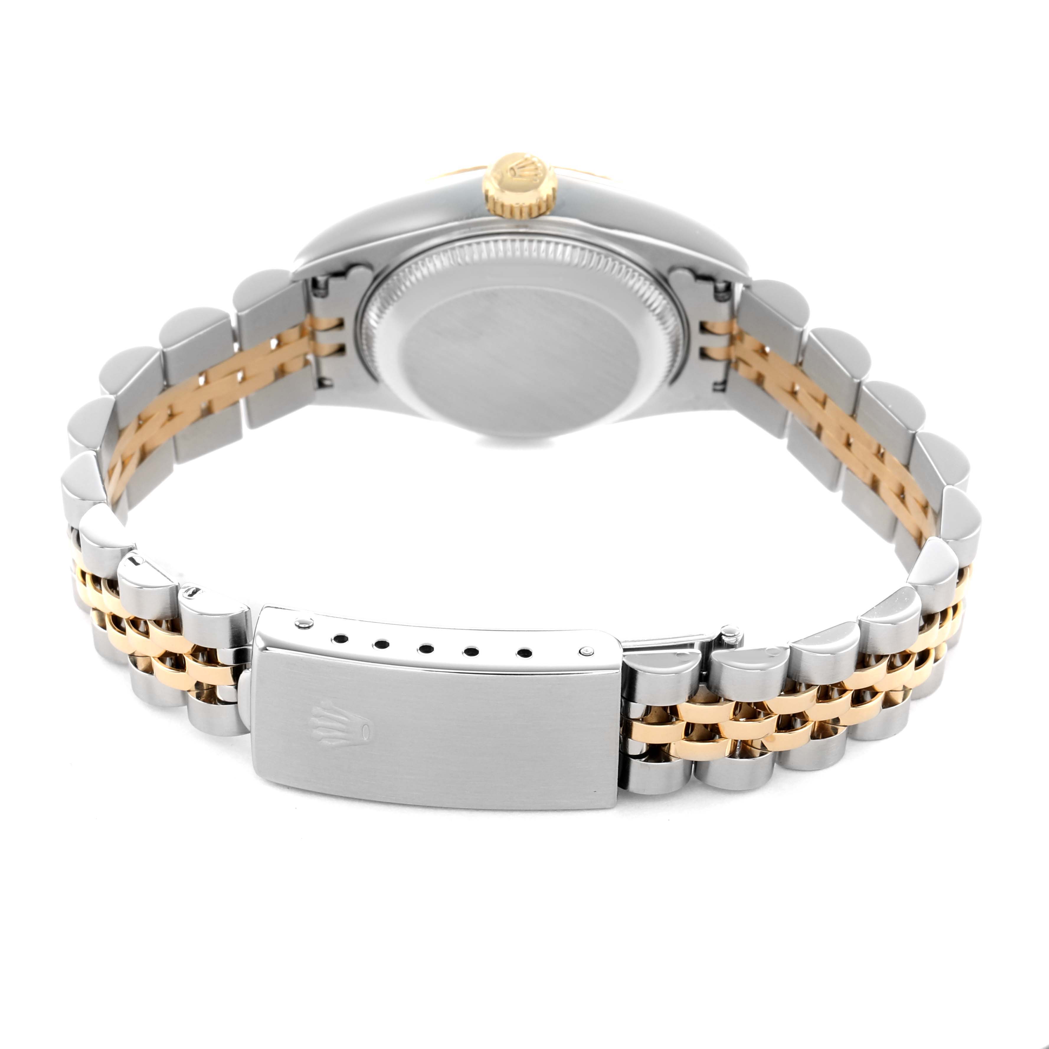 The image shows the back and clasp of the Rolex Datejust 69173 Women's Steel and Gold (two tone) Black Dial, highlighting the two-tone bracelet and case back.