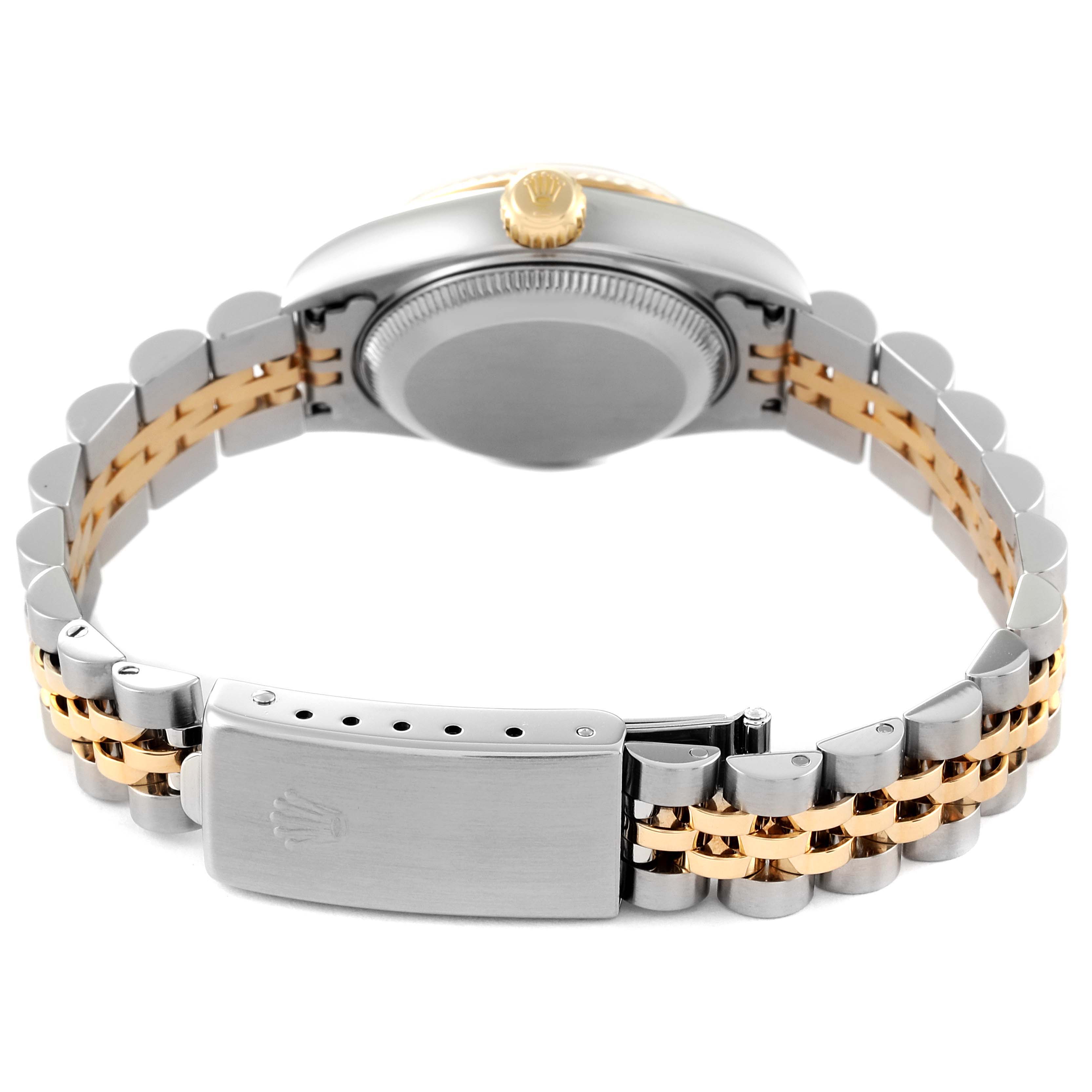 This image shows the Rolex Datejust 79173 Women's Steel and Gold (two tone) Champagne Dial 79173 Women's Steel and Gold (two tone) Champagne Dial watch from the back, highlighting the case back, winding crown, and bicolor strap and clasp.