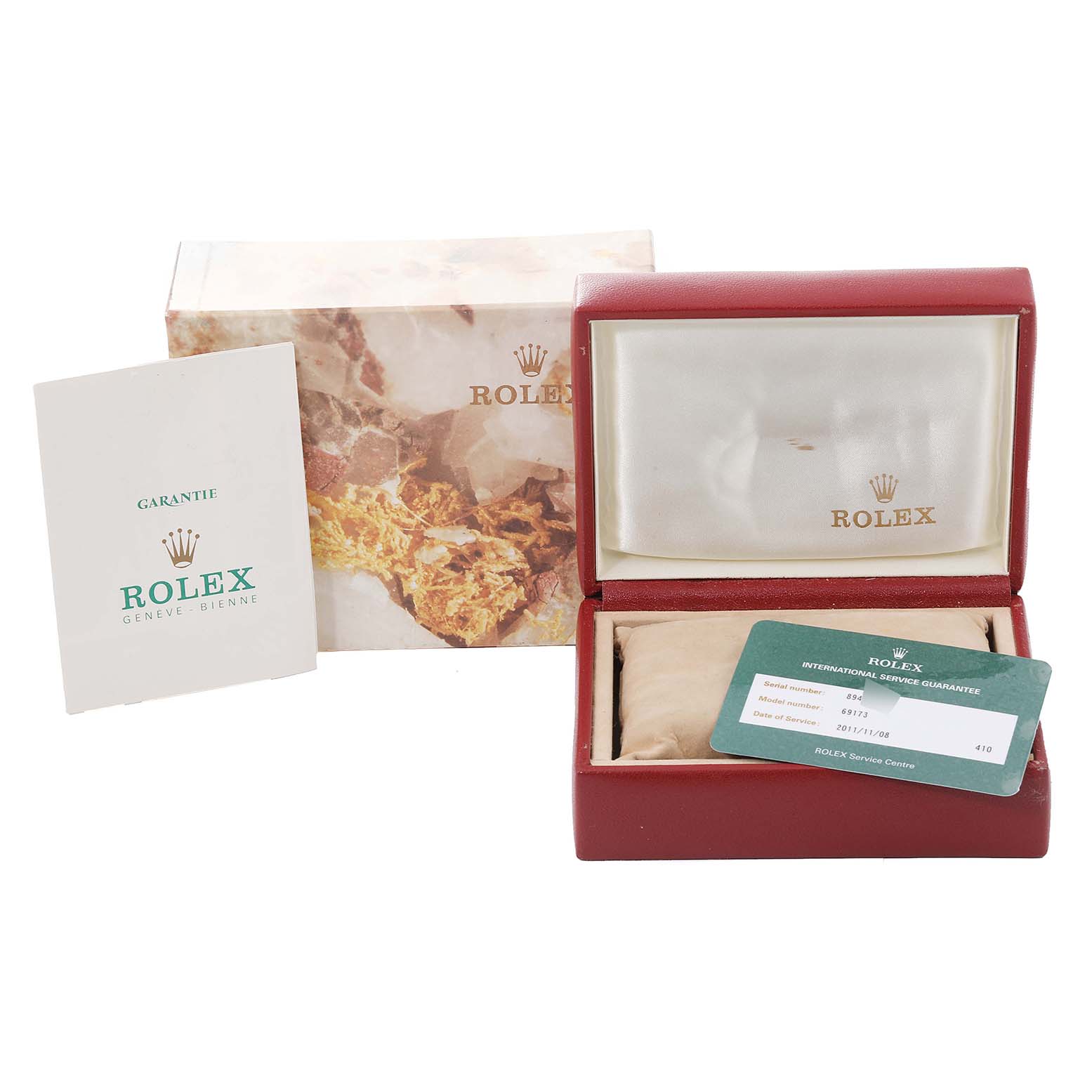 The image shows a Rolex Datejust 69173 Women's Steel and Gold (two tone) Champagne Dial 69173 Women's Steel and Gold (two tone) Champagne Dial box, guarantee card, and booklets, all viewed from the front.