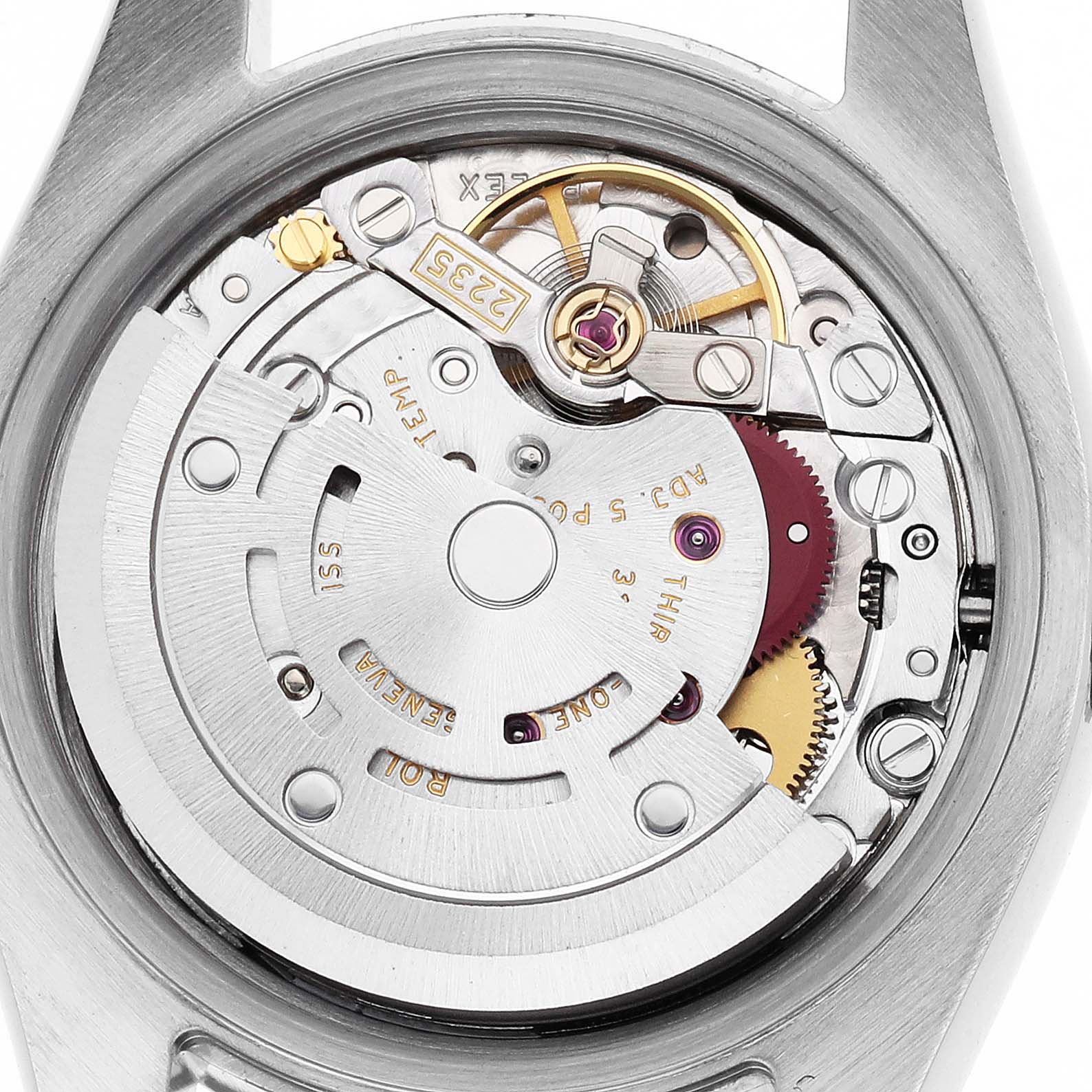 The image shows the movement of a Rolex Datejust 179173 Women's Steel and Gold (two tone) Grey Dial watch from the back, highlighting gears and components.