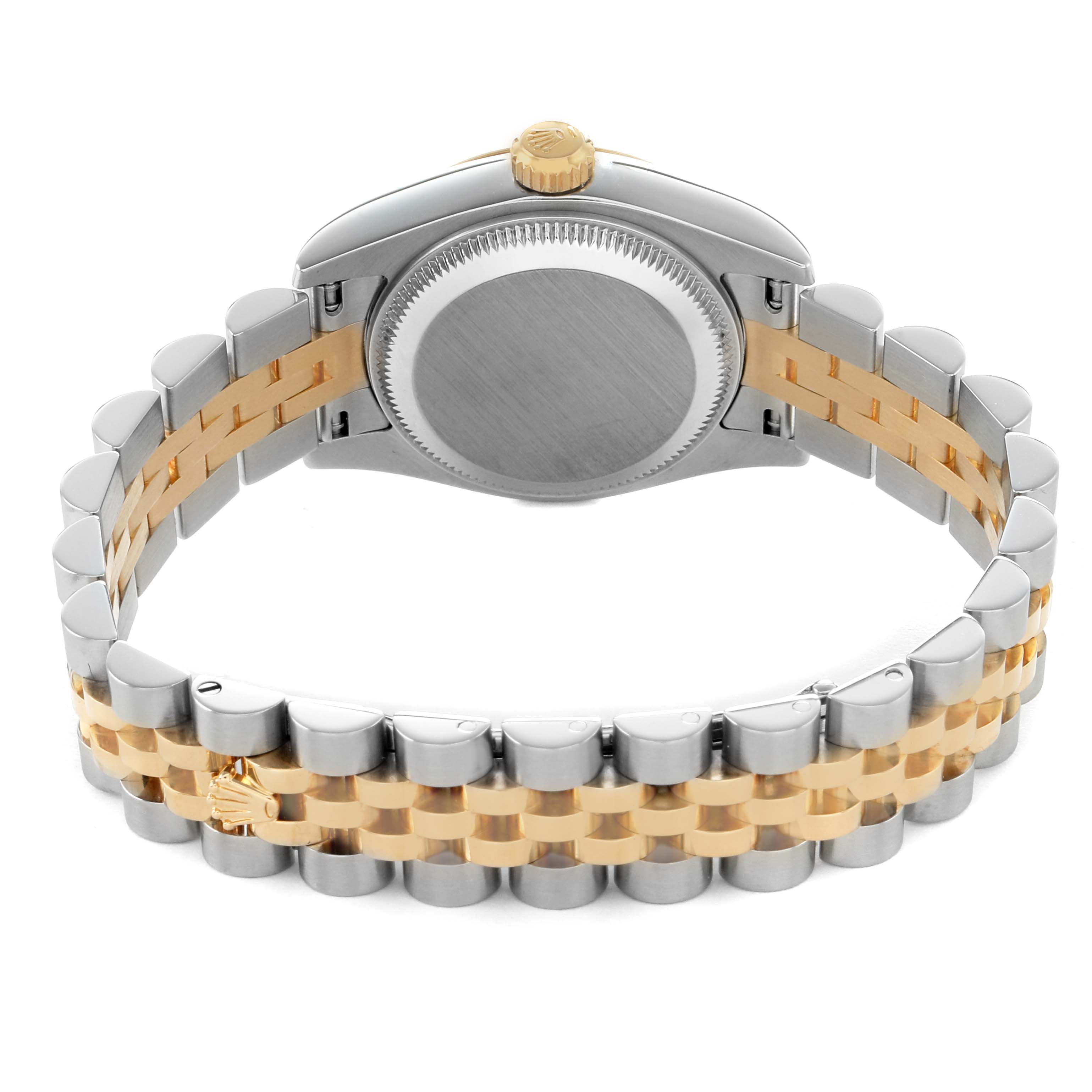 The image shows the backside of a Rolex Datejust 179173 Women's Steel and Gold (two tone) Grey Dial, highlighting the case back and the jubilee bracelet.
