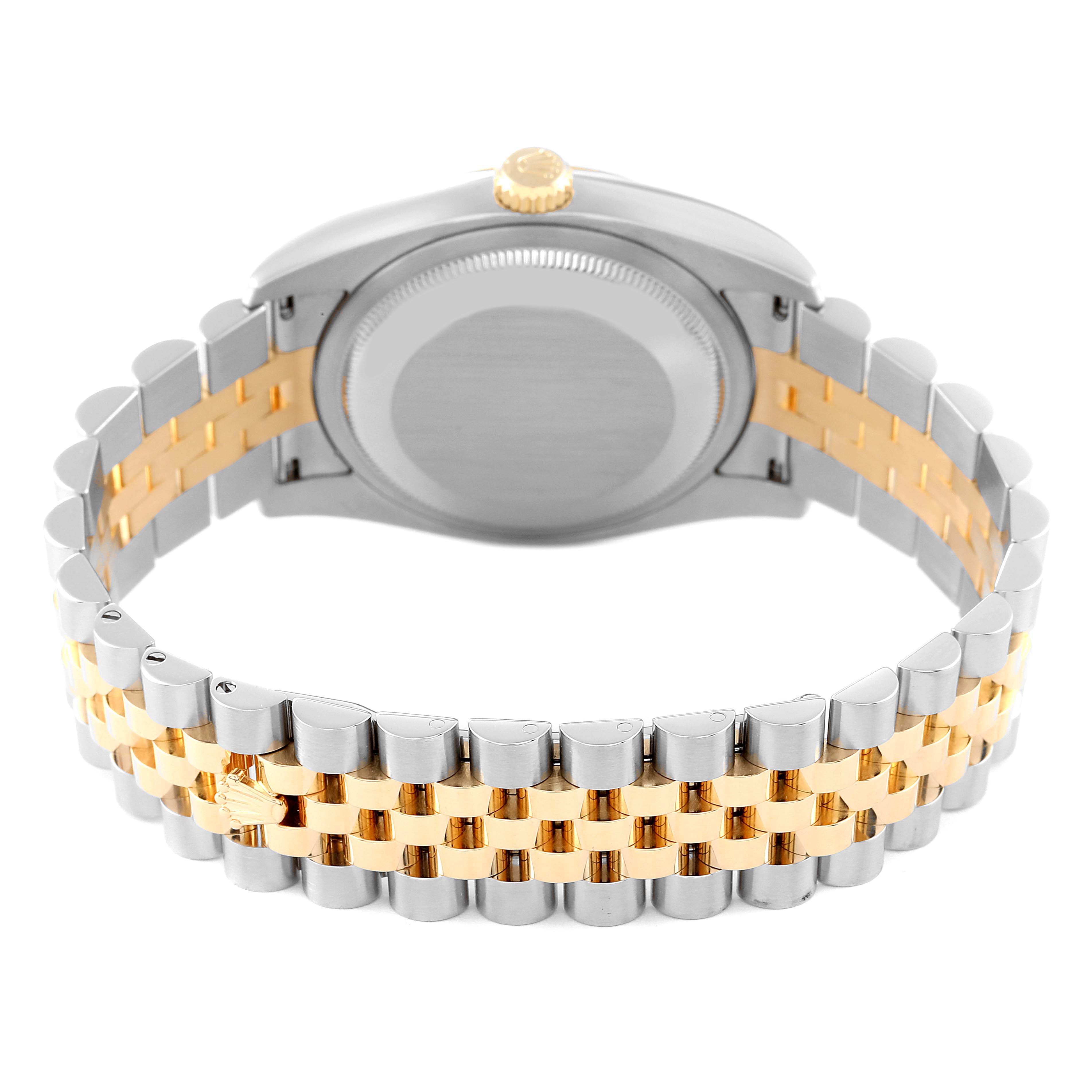 This image shows the back of a Rolex Datejust 116233 Men's Steel and Gold (two tone) Beige Dial 116233 Men's Steel and Gold (two tone) Beige Dial watch, highlighting its two-tone bracelet and caseback.
