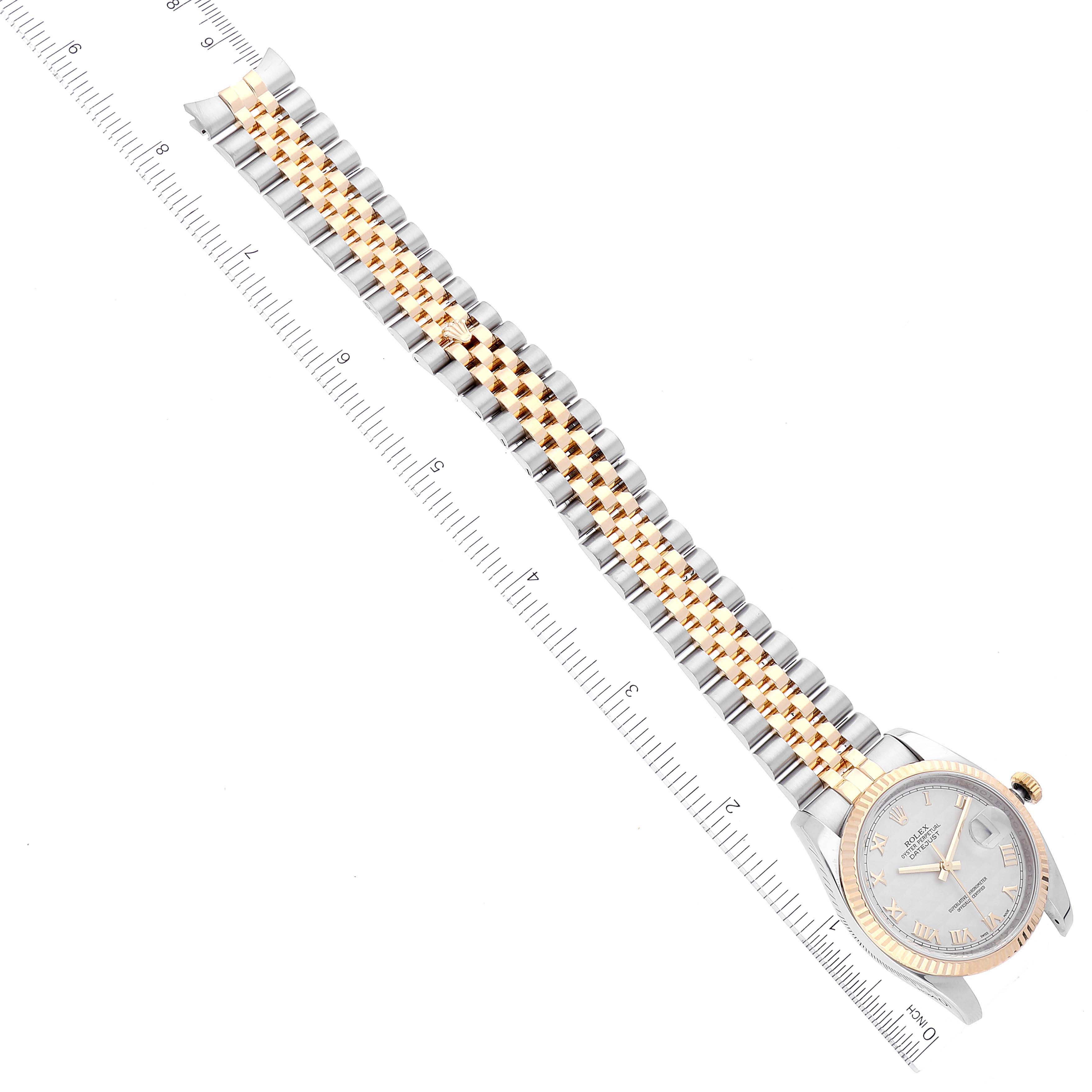 The image shows a Rolex Datejust 116233 Men's Steel and Gold (two tone) Beige Dial 116233 Men's Steel and Gold (two tone) Beige Dial watch from a top view, displaying the face, bezel, and two-tone bracelet, placed next to a ruler.