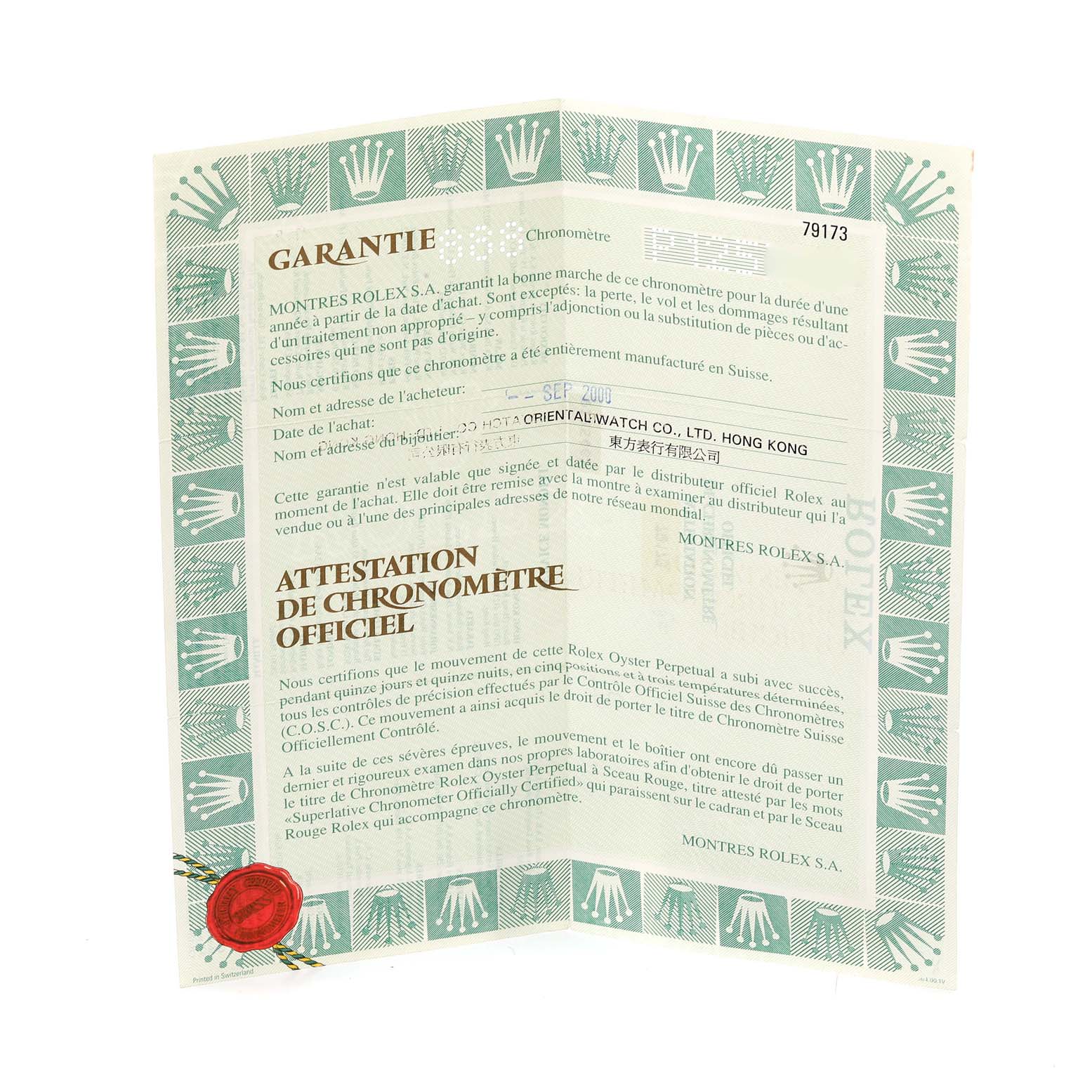 This image shows the warranty and certification papers for a Rolex Datejust 79173 Women's Steel and Gold (two tone) White Dial 79173 Women's Steel and Gold (two tone) White Dial watch, angled slightly open.