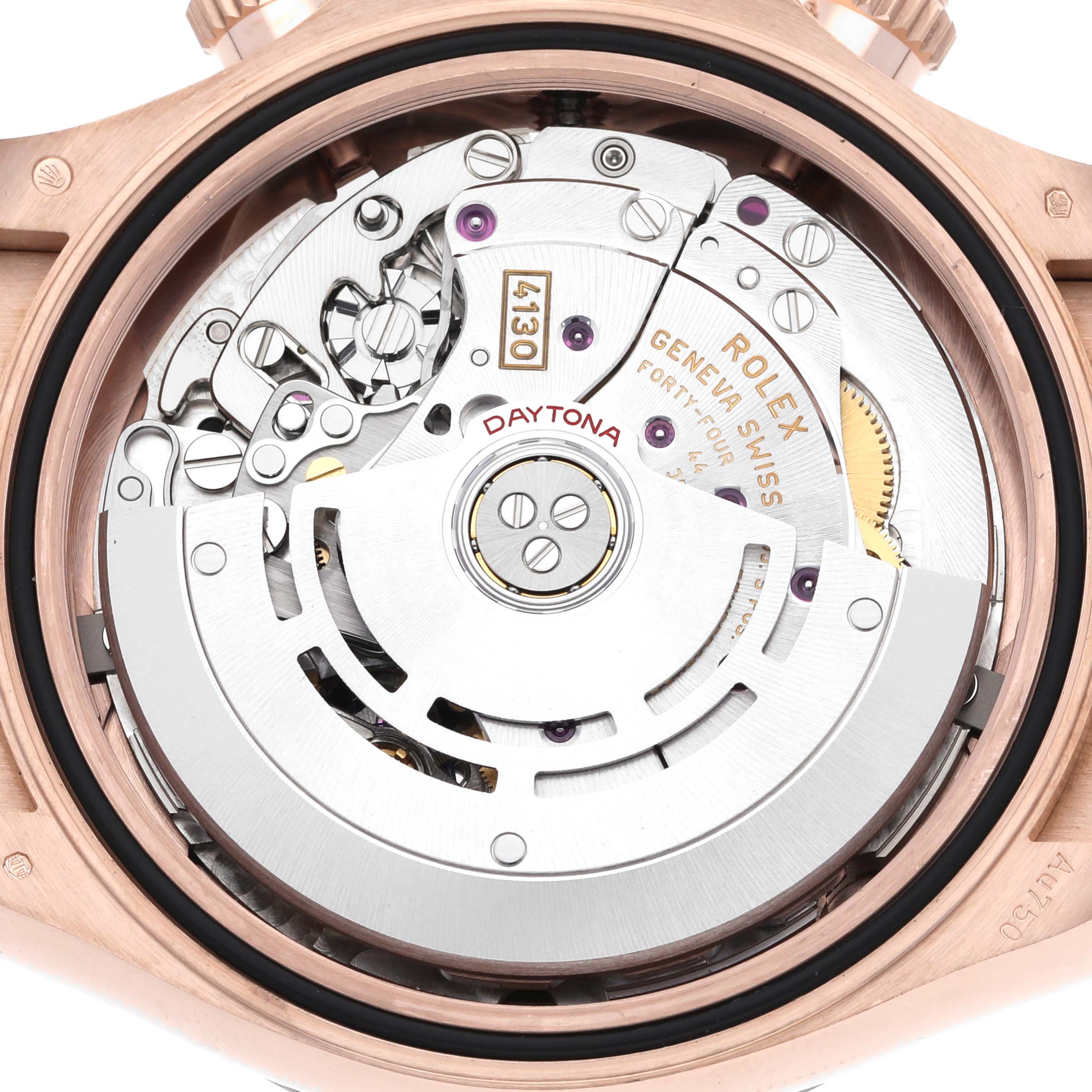 The image shows the internal mechanism of a Rolex Daytona 116515LN Men's Rose Gold Black Dial 116515LN Men's Rose Gold Black Dial watch from a rear angle, highlighting its intricate movement.