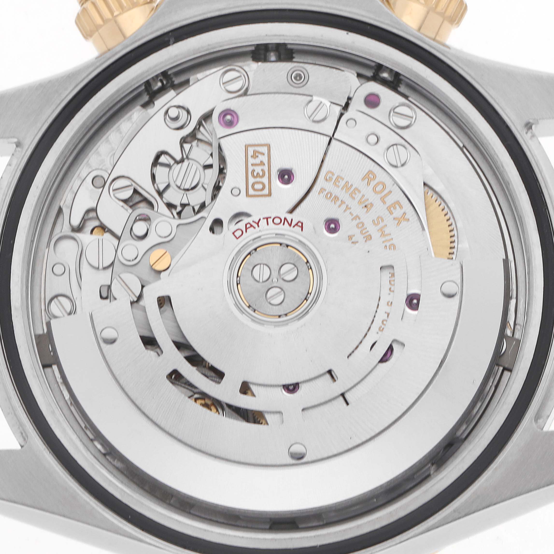 The image shows the movement of a Rolex Daytona 116503 Men's Steel and Gold (two tone) Black Dial watch from the back, highlighting intricate mechanical components.