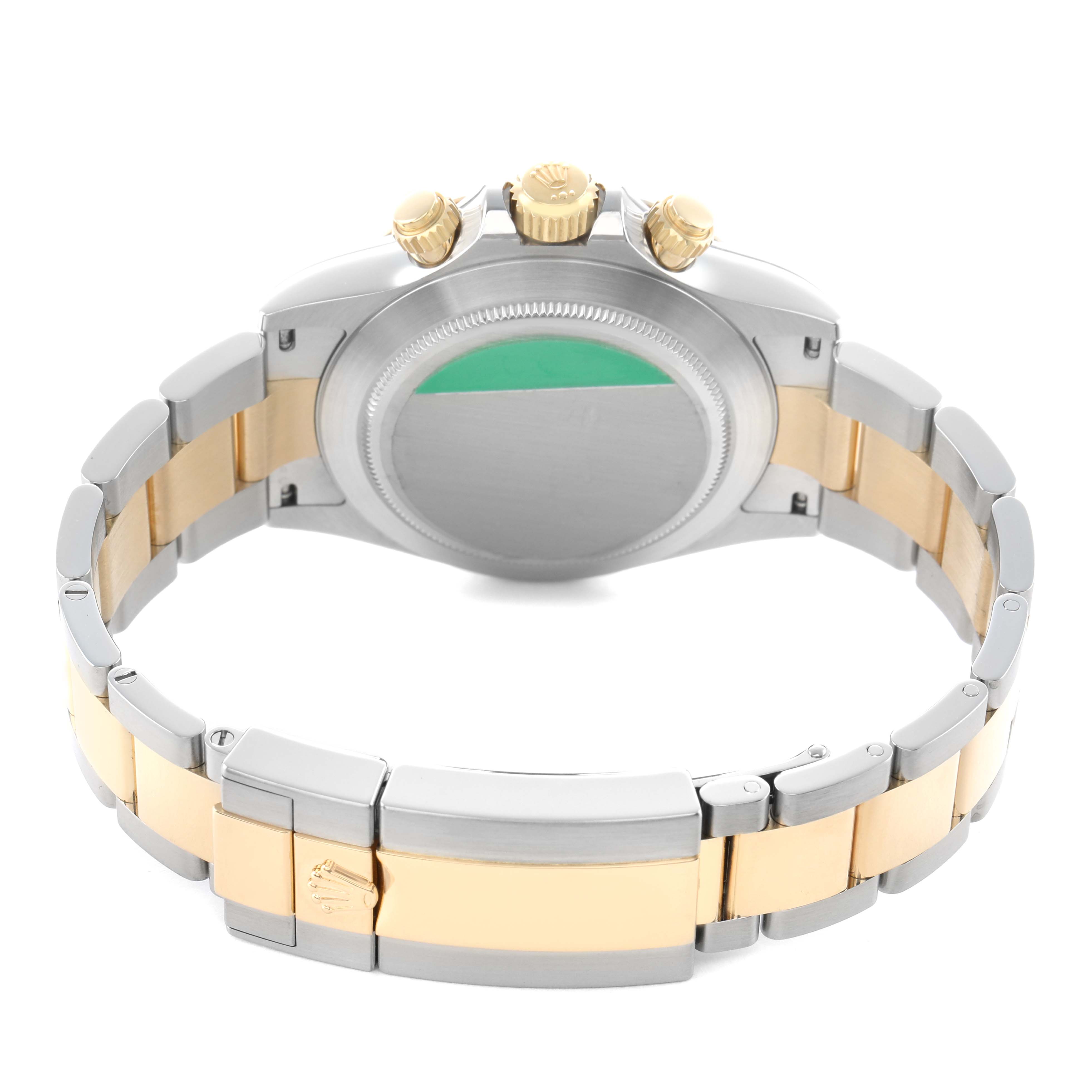 The image shows the case back and bracelet of a Rolex Daytona 116503 Men's Steel and Gold (two tone) Black Dial, with gold and silver-tone links and exposed crown and pushers.