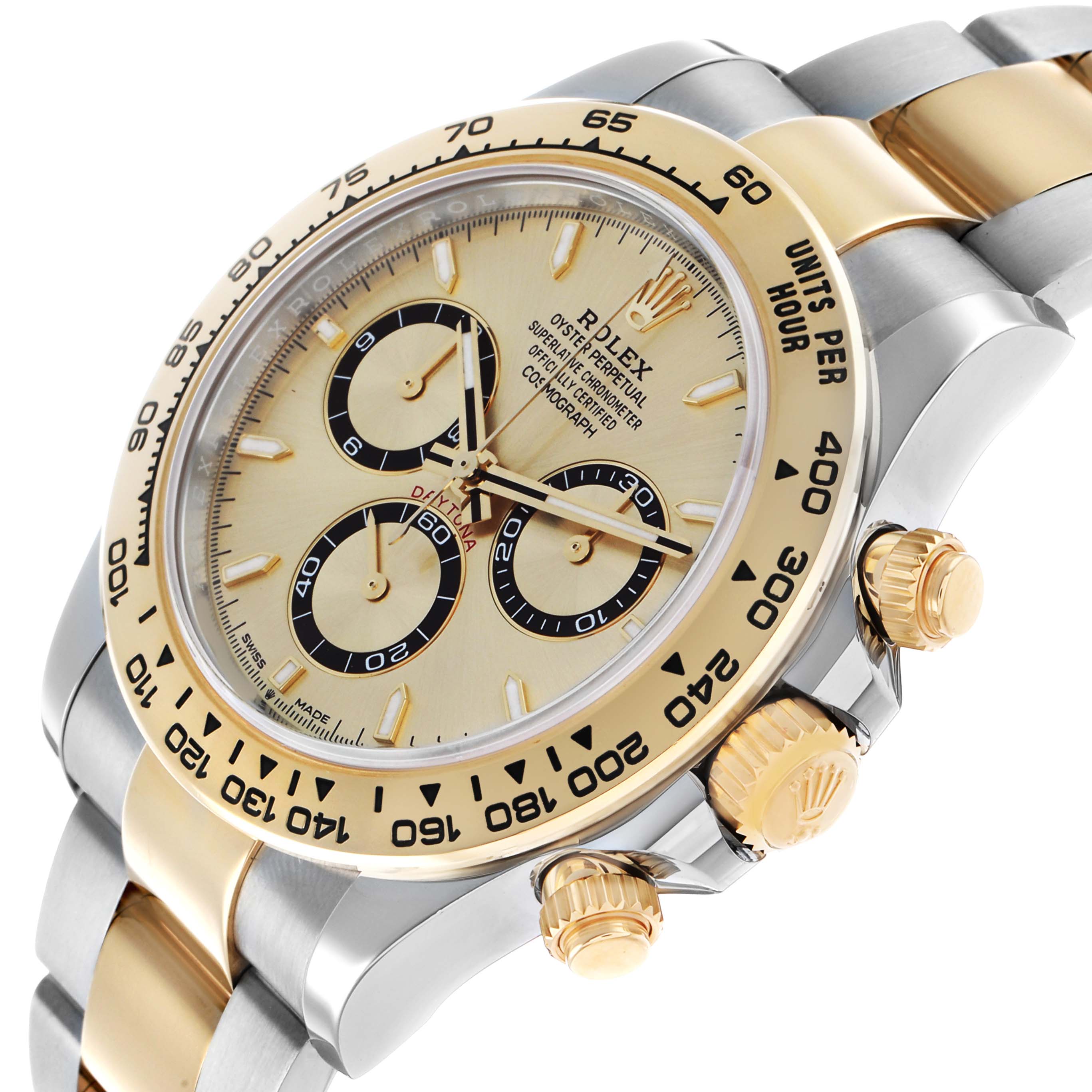 The Rolex Daytona 126503 Men's Steel and Gold (two tone) Champagne Dial watch is shown at an angled side view highlighting the dial, bezel, crown, and bracelet.