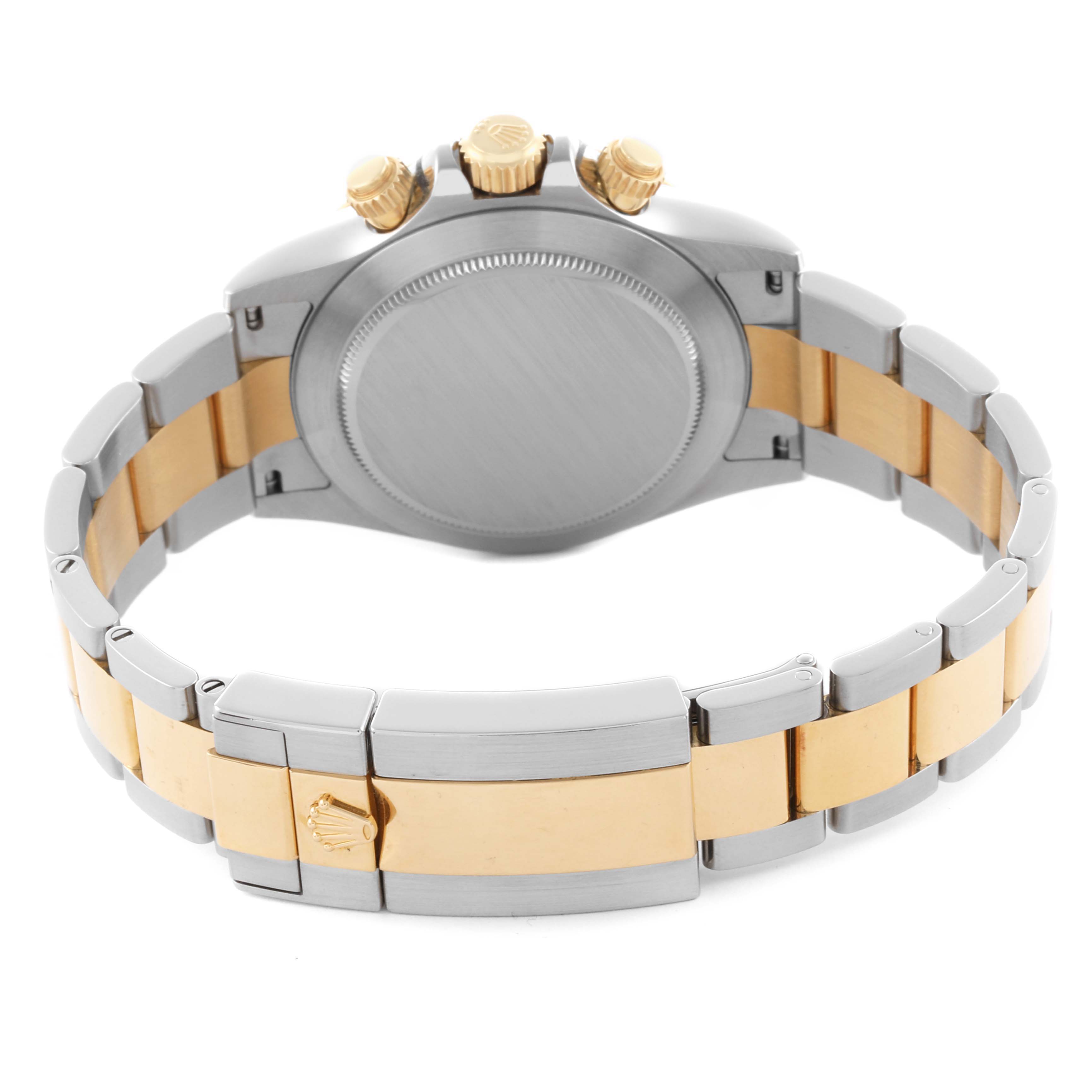 The Rolex Daytona 116503 Men's Steel and Gold (two tone) Mother of Pearl Dial 116503 Men's Steel and Gold (two tone) Mother of Pearl Dial is shown from the back, featuring its case back, bracelet, and crown in a two-tone metal finish.