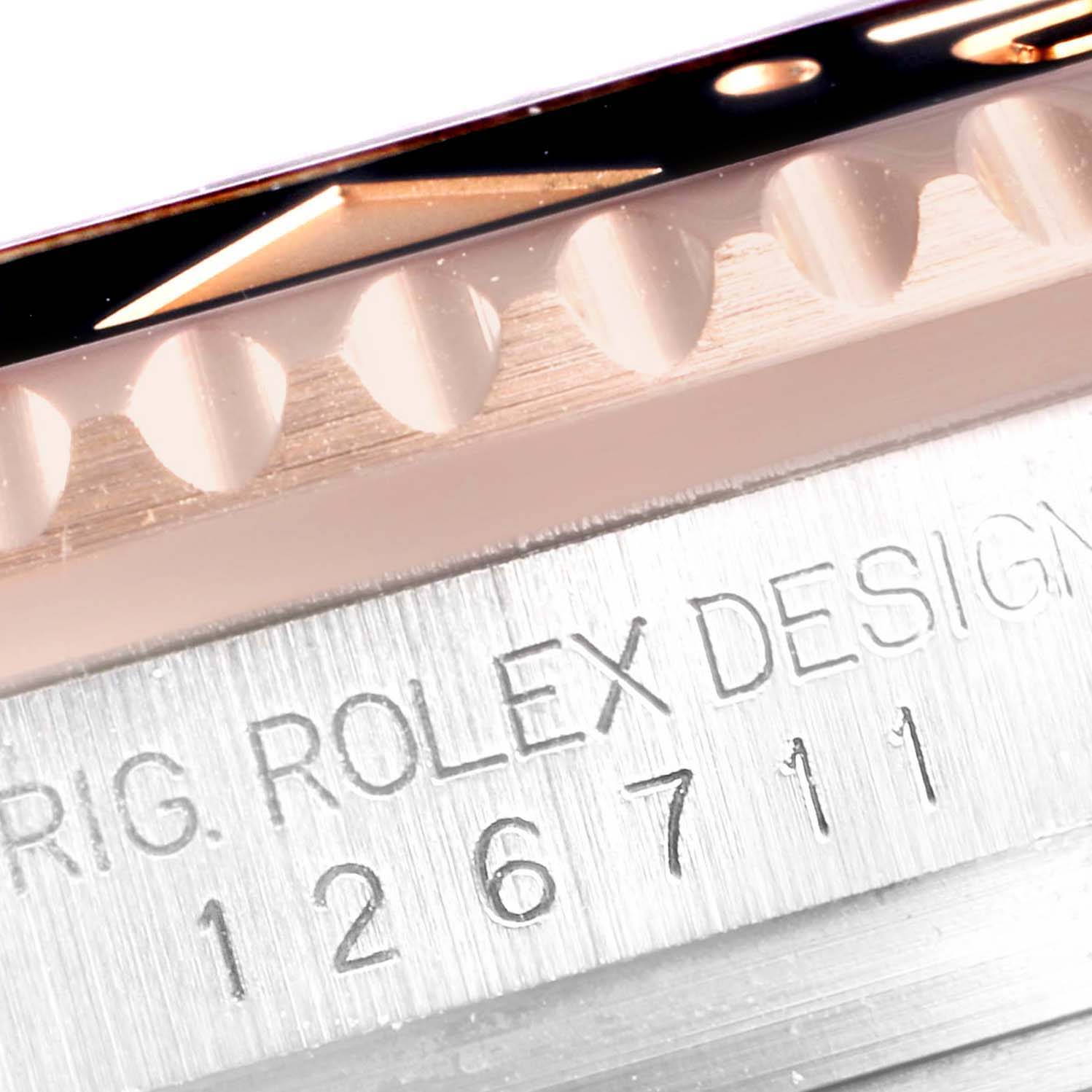The image shows a close-up angle of the bezel and model number engraving on the side of the Rolex GMT-Master 126711 Men's Stainless Steel Black Dial 126711 Men's Stainless Steel Black Dial watch.