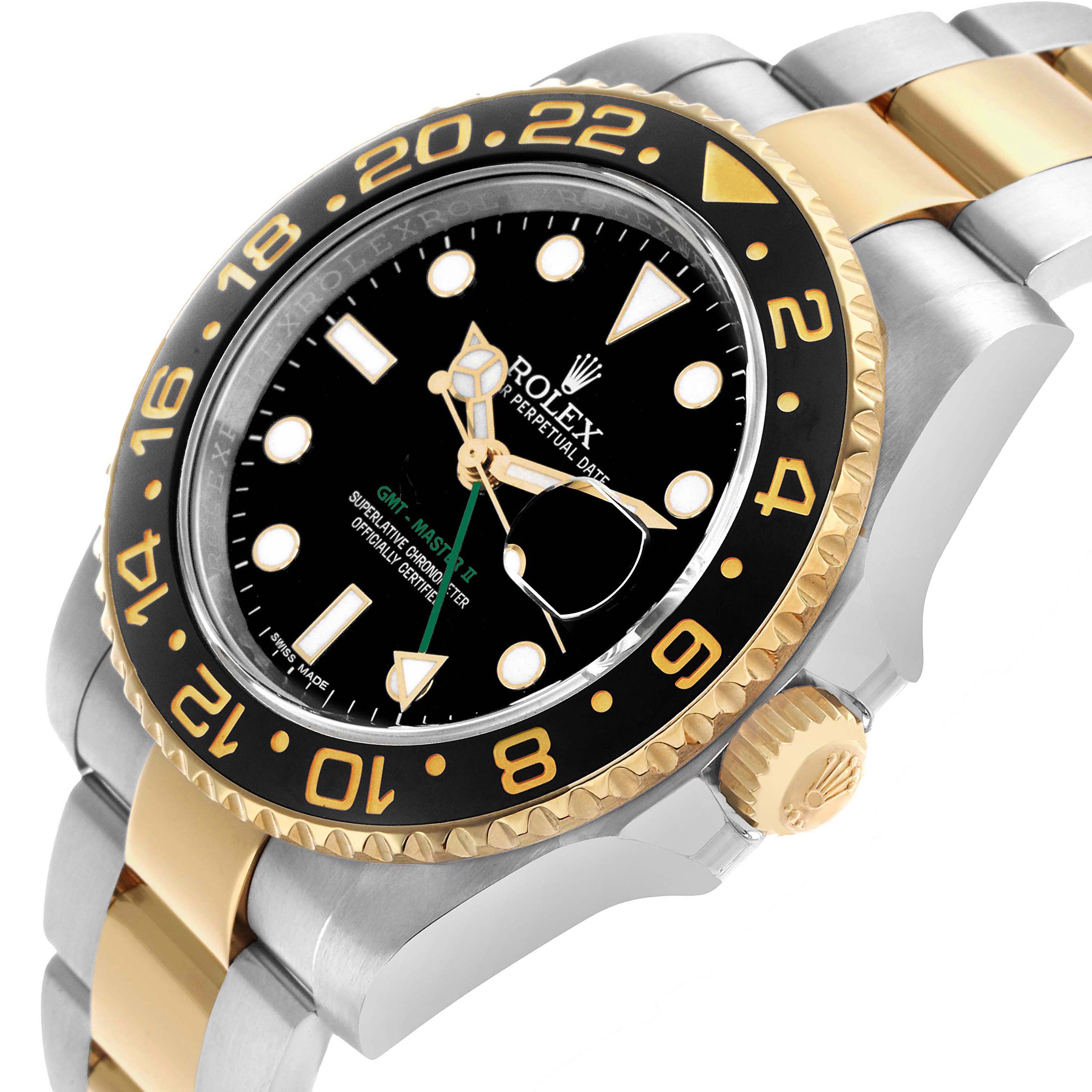 The image shows a Rolex GMT-Master 116713 Men's Steel and Gold (two tone) Black Dial watch angled to display the bezel, dial, crown, and part of the bracelet.