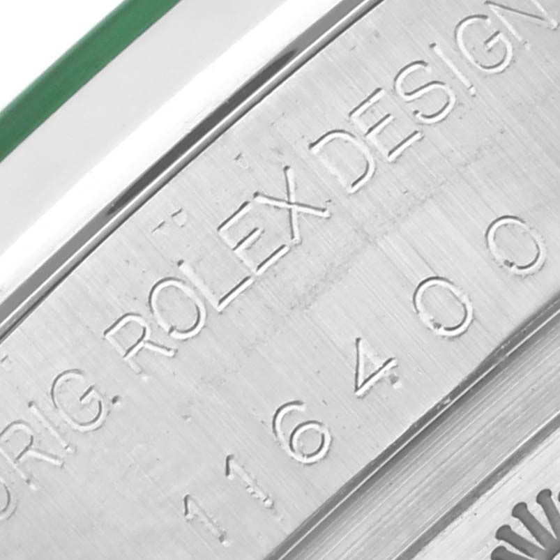 The image shows the side and engraved details of the Rolex Milgauss 116400GV Men's Stainless Steel Blue Dial 116400GV Men's Stainless Steel Blue Dial model.