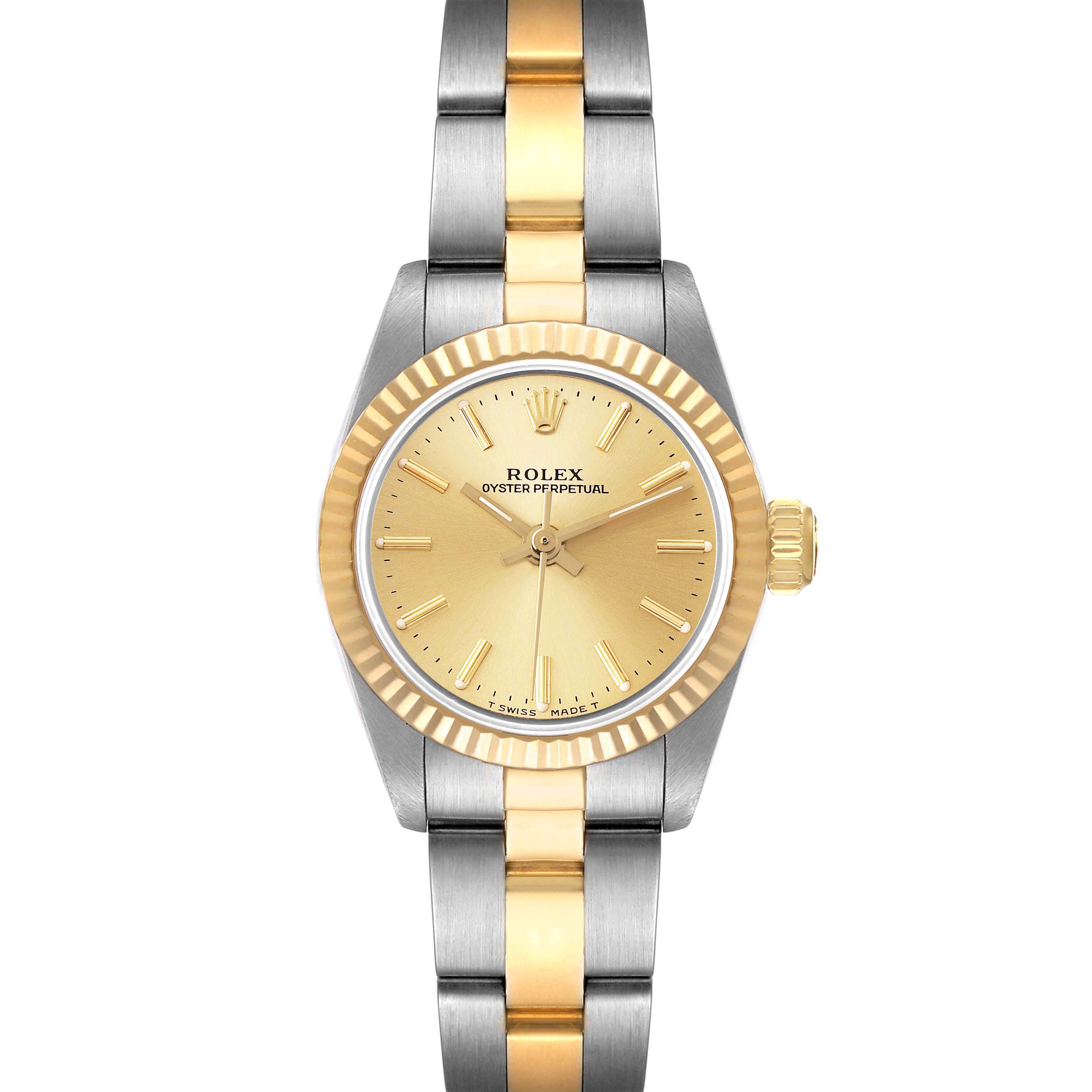 The Oyster Perpetual by Rolex is shown from a top-down angle, highlighting its dial, bezel, and two-tone bracelet.