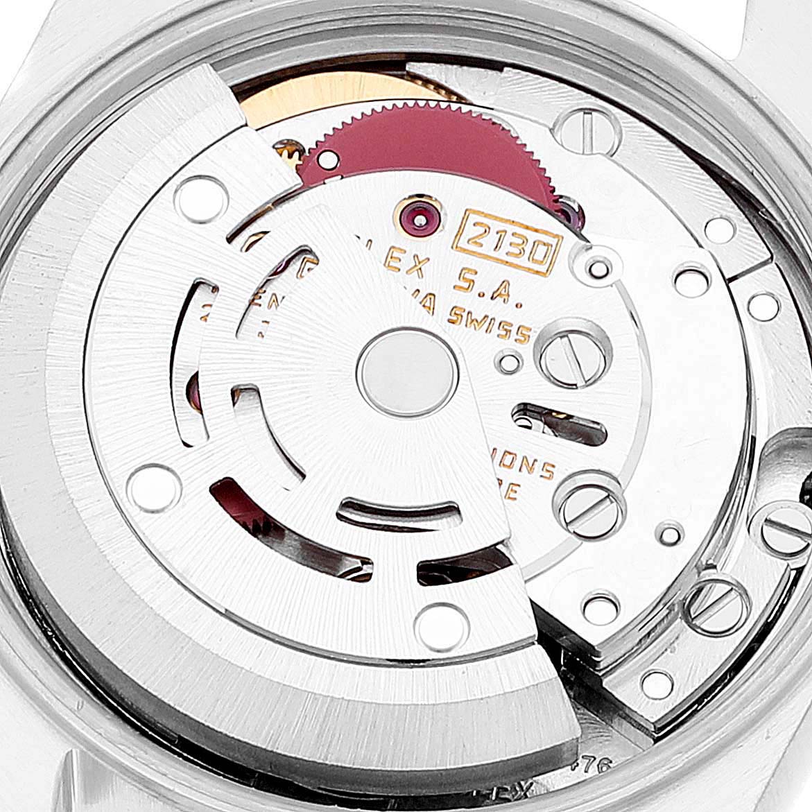 This image shows the inner mechanical movement of a Rolex Oyster Perpetual 67193 Women's Steel and Gold (two tone) Champagne Dial 67193 Women's Steel and Gold (two tone) Champagne Dial watch, highlighting the rotor and gears.