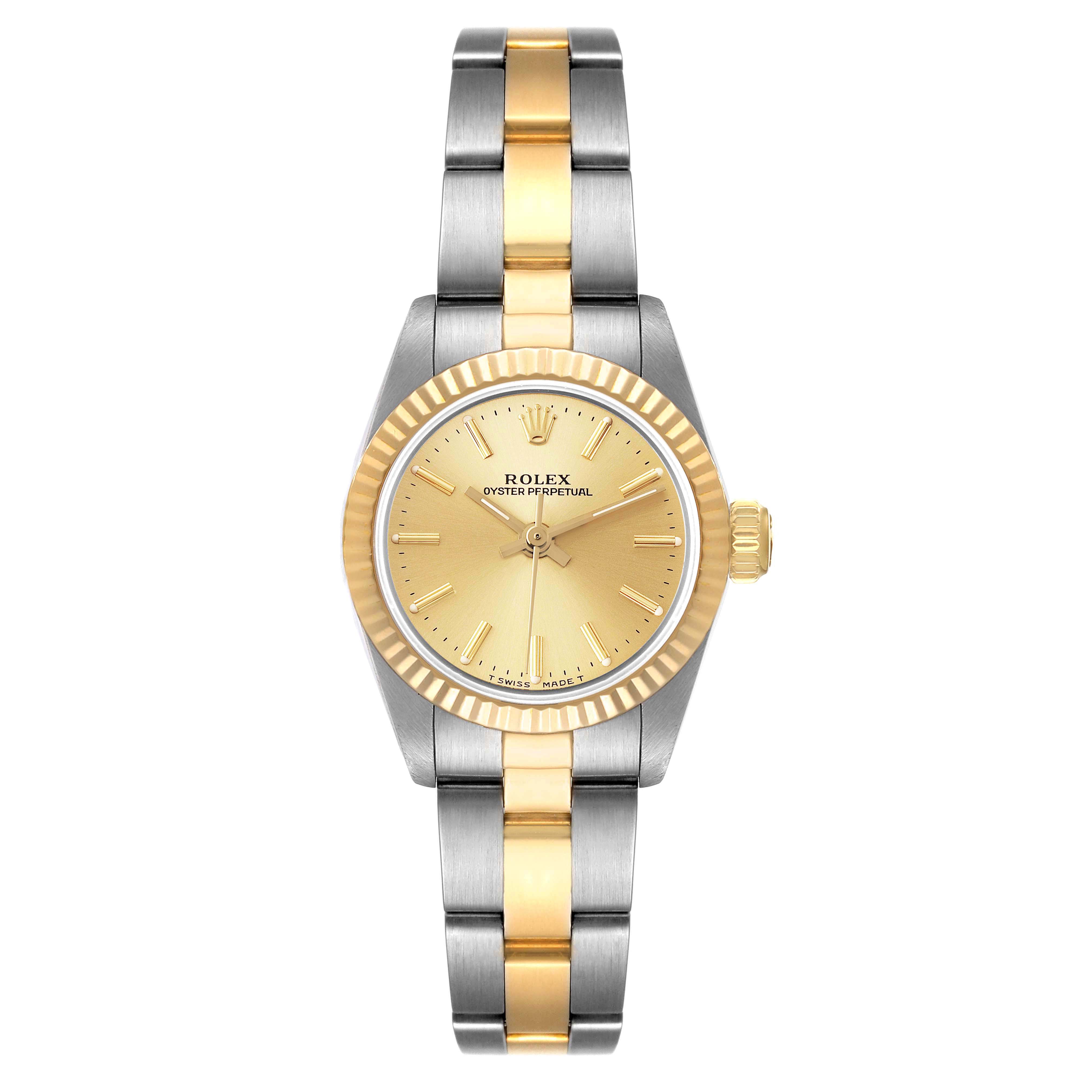 This image shows a front view of a Rolex Oyster Perpetual 67193 Women's Steel and Gold (two tone) Champagne Dial 67193 Women's Steel and Gold (two tone) Champagne Dial watch with a gold dial and a two-tone metal bracelet.