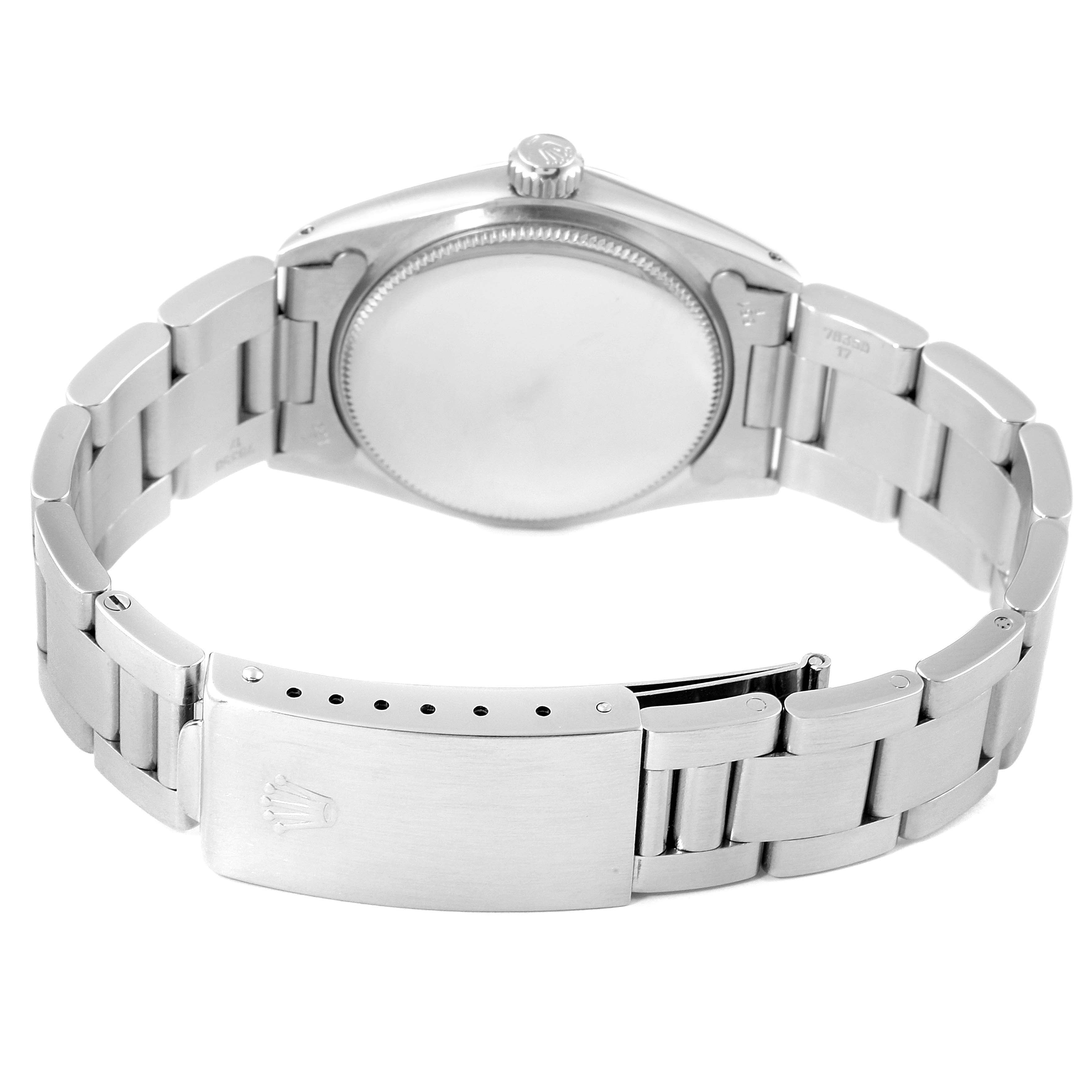 This image shows the back case and clasp of the Rolex Vintage Collection 6466 Men's Stainless Steel Silver Dial 6466 Men's Stainless Steel Silver Dial watch.