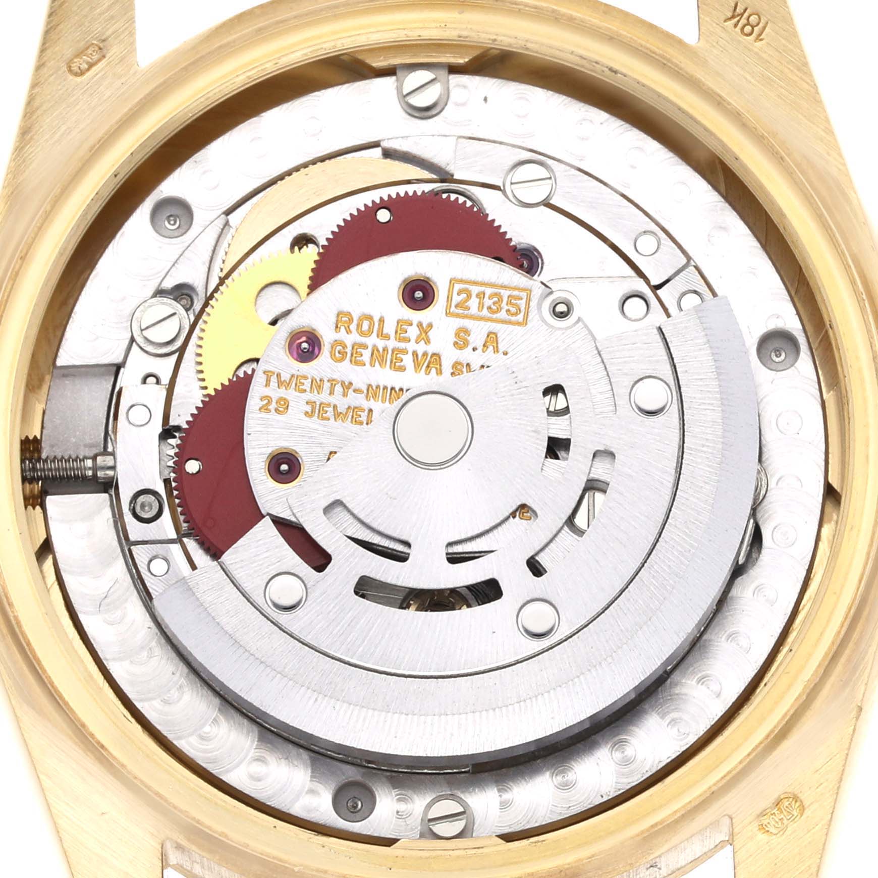 The image shows a close-up of the Rolex President 68278 Women's Yellow Gold Silver Dial 68278 Women's Yellow Gold Silver Dial watch's movement with visible gears and jewels.