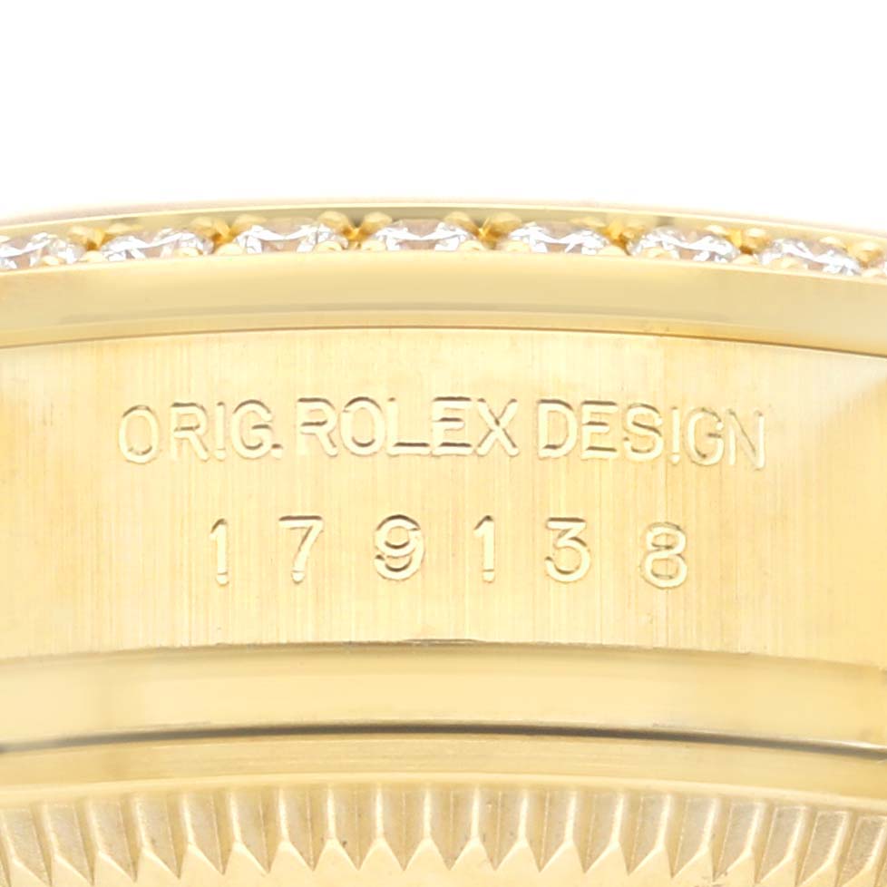 The image shows a close-up of the model number engraving on the side of the Rolex President 179138 Women's Yellow Gold Champagne Dial 179138 Women's Yellow Gold Champagne Dial watch case.