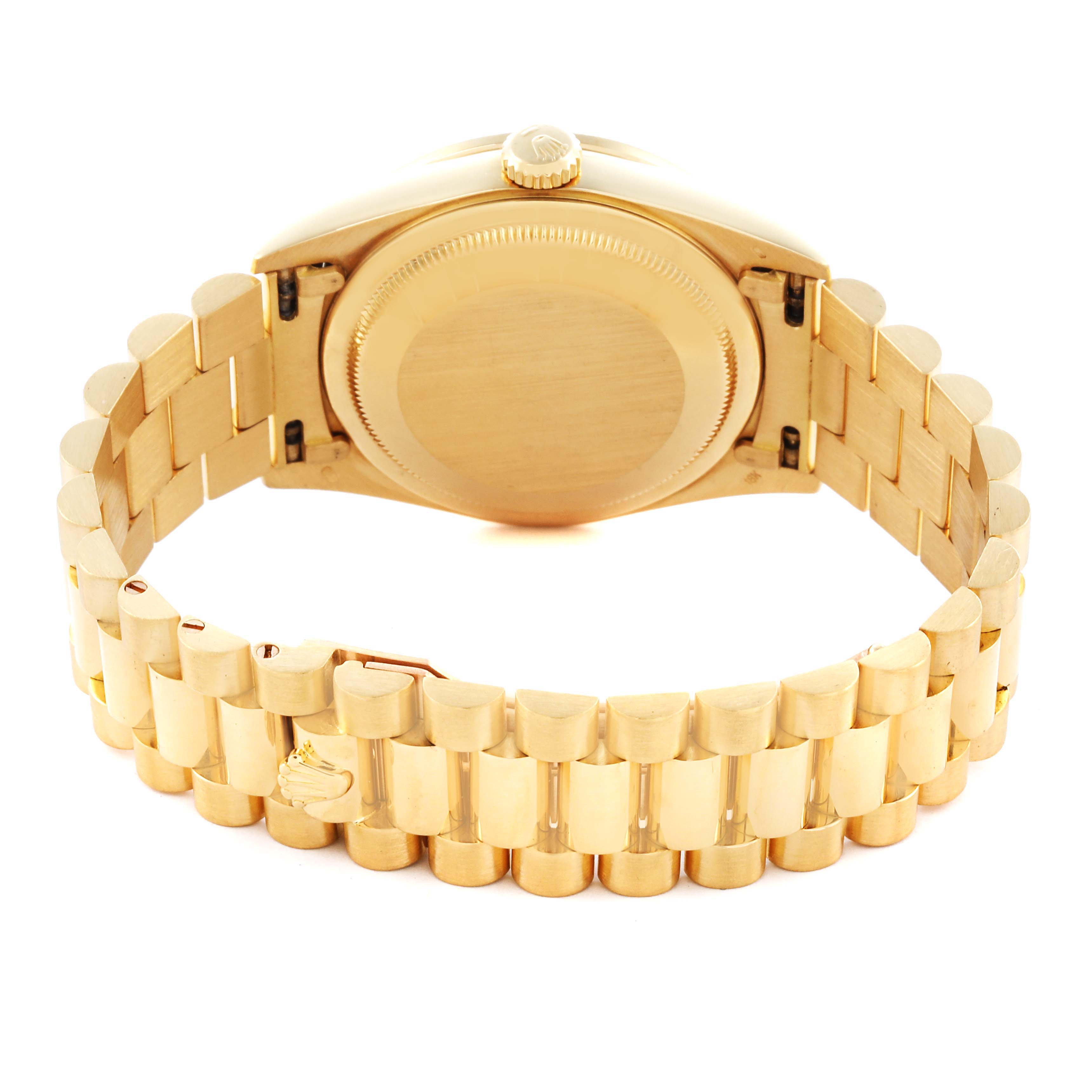 The Rolex President 18388 Men's Yellow Gold Champagne Dial 18388 Men's Yellow Gold Champagne Dial model is shown from the back, highlighting the case back and the full gold bracelet clasp.
