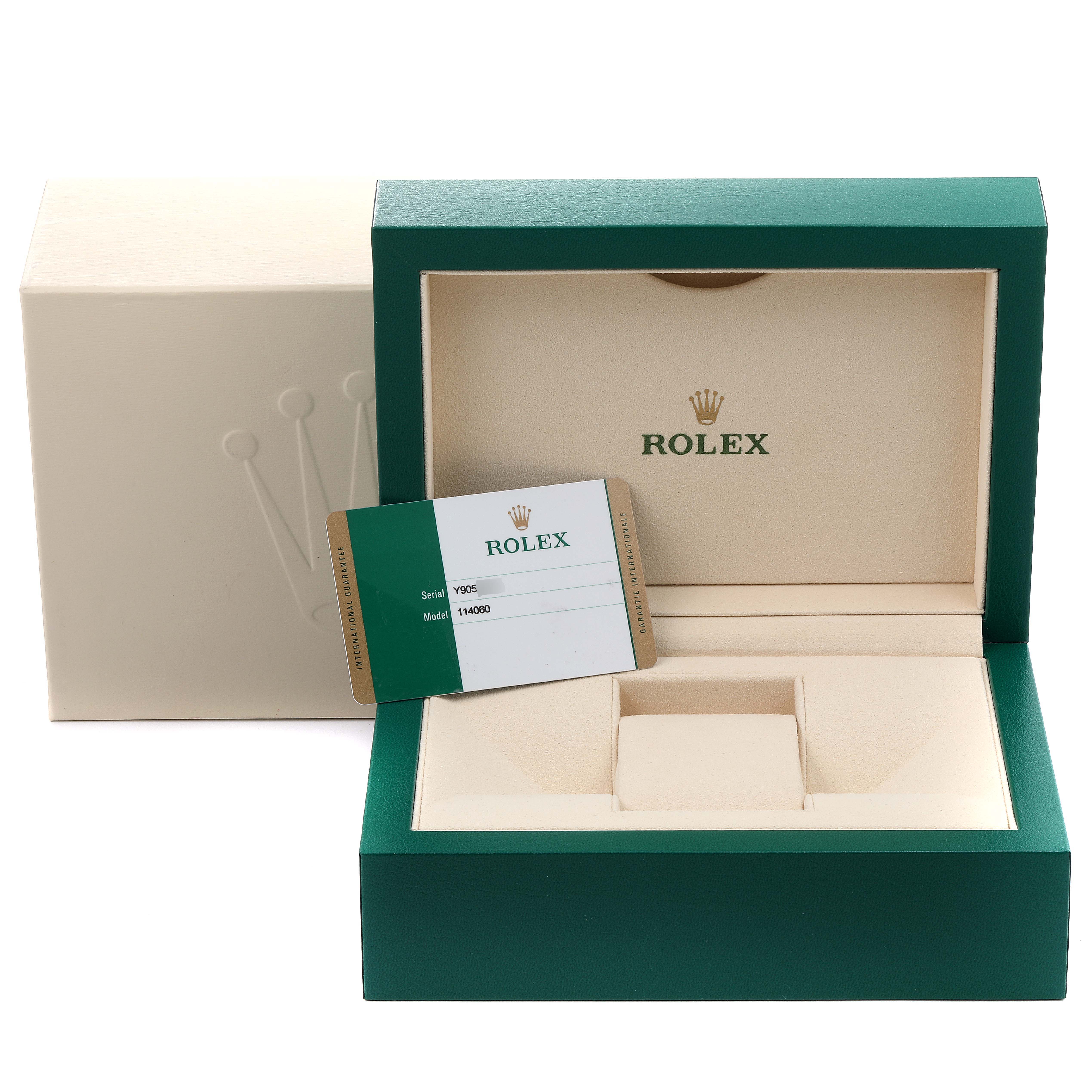 The image shows the box and authentication card for a Rolex Submariner 114060 Men's Stainless Steel Black Dial 114060 Men's Stainless Steel Black Dial model.