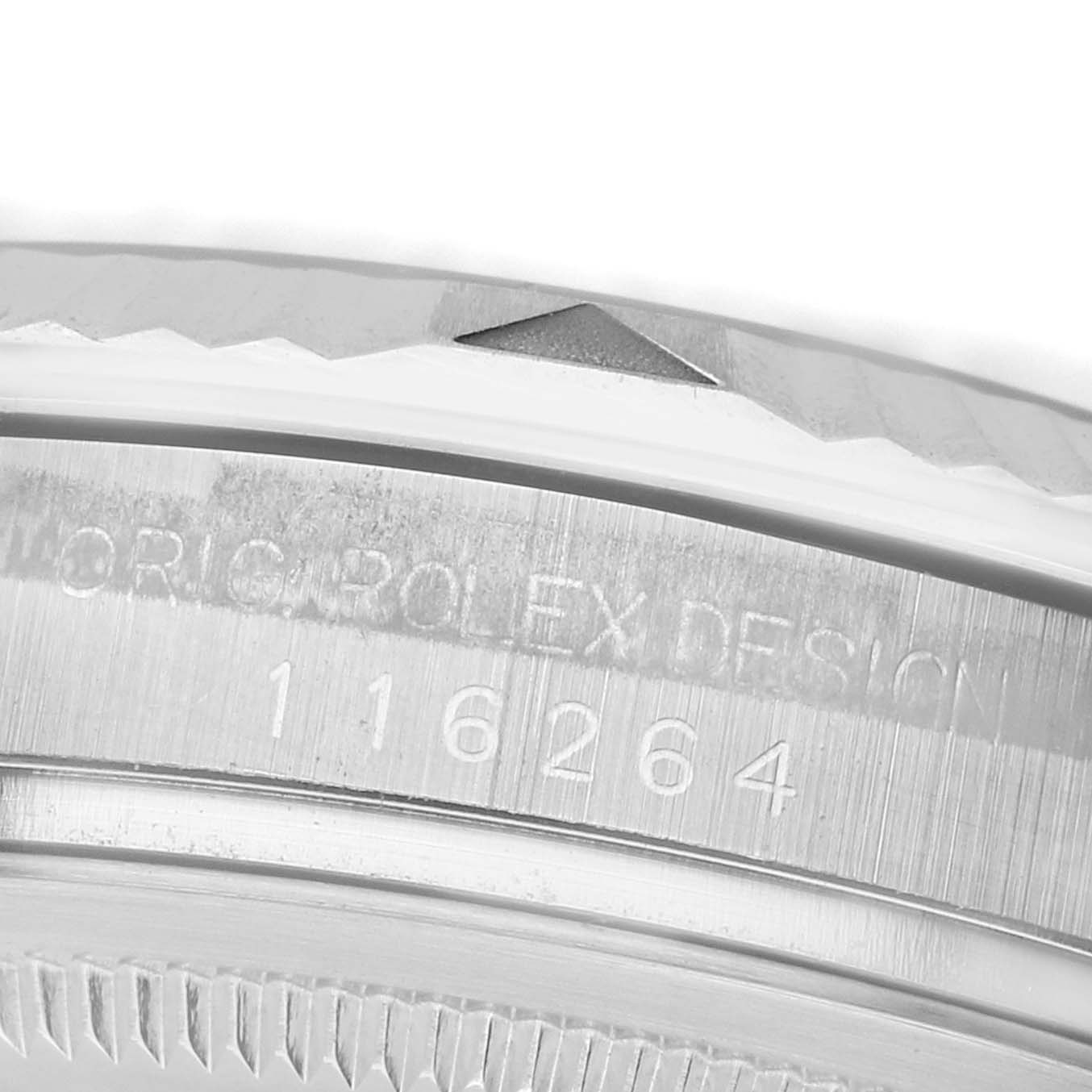 The image shows an angled close-up of the side of a Rolex Turn-o-Graph 116264 Men's Stainless Steel Black Dial, featuring the bezel and model engraving.