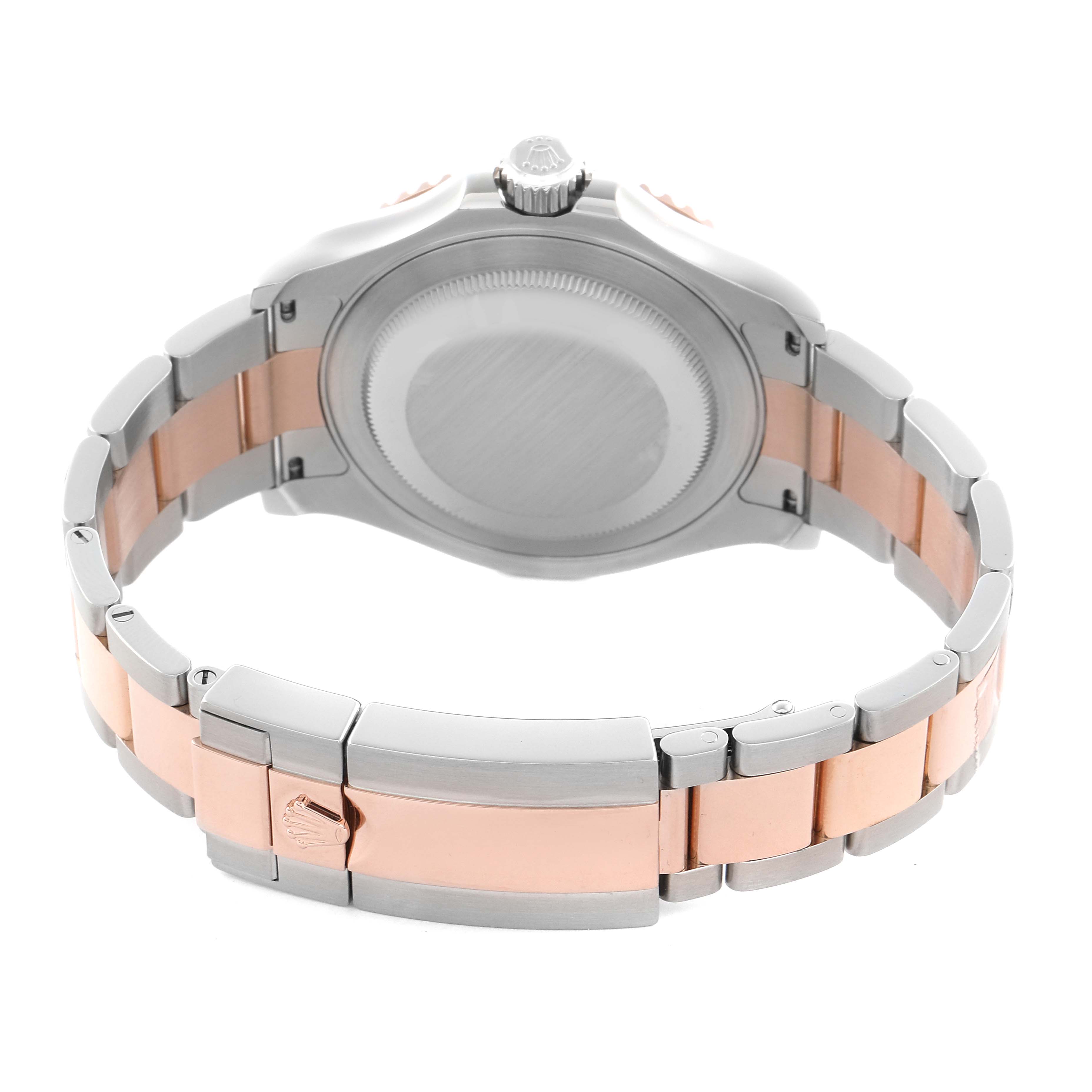 The image shows the back and bracelet of the Rolex Yacht-Master 116621 Men's Steel and Gold (two tone) Brown Dial watch at a rear angle.