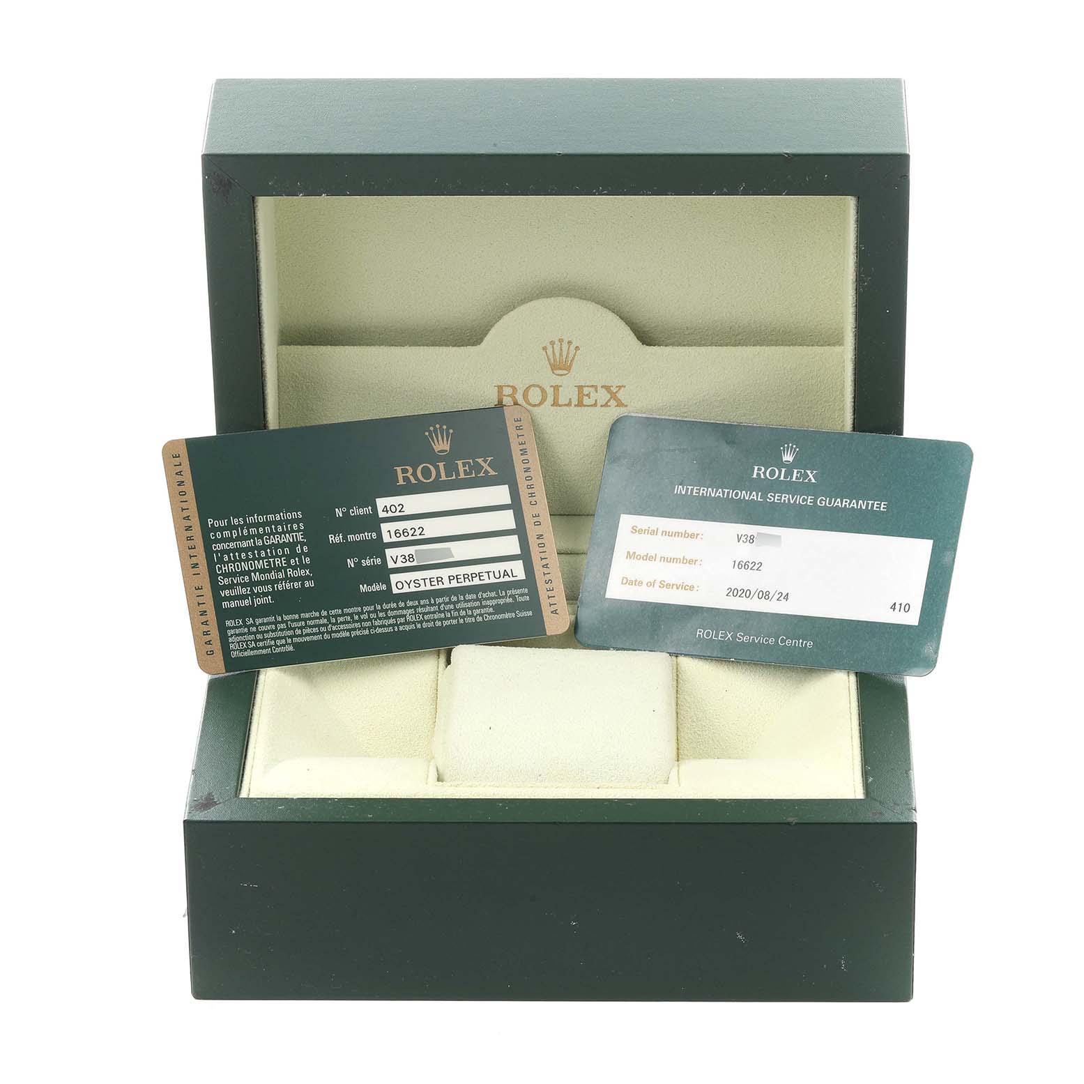 The image shows the packaging and warranty cards for the Rolex Yacht-Master 16622 Men
s Stainless Steel Silver Dial 16622 Men
s Stainless Steel Silver Dial, with an empty box displayed from the front.