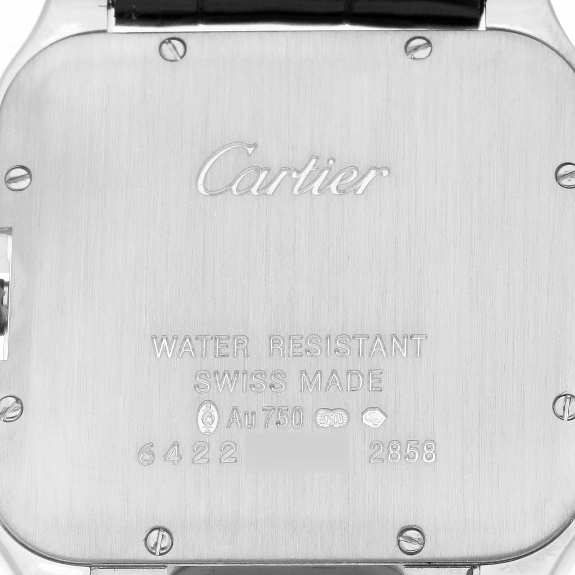 The image shows the back of a Cartier Santos Dumont WH100251 Men's White Gold Silver Dial watch, featuring its branding and specifications.