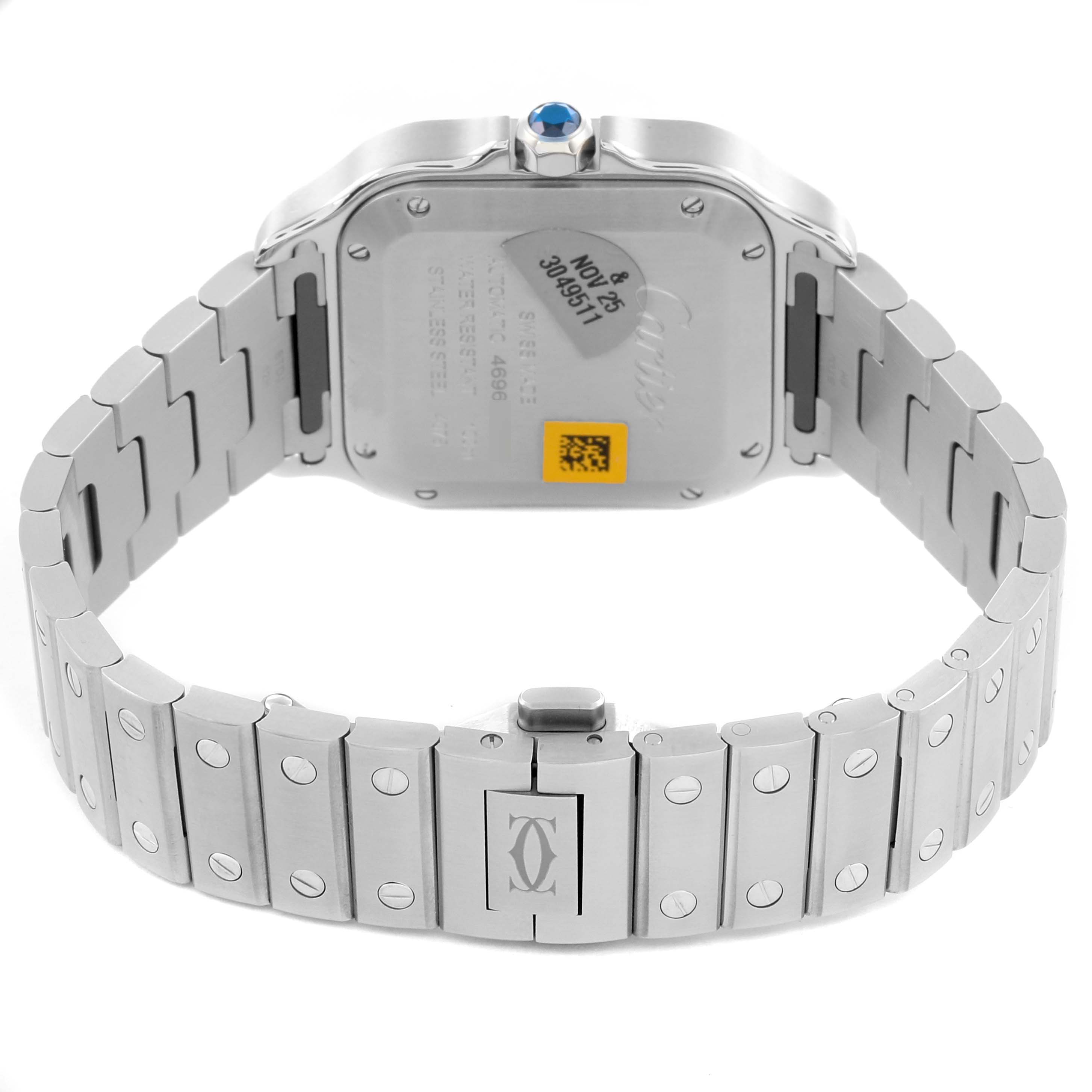 The image shows the back and bracelet of a Cartier Santos W4SA0005 Men
s Stainless Steel Silver Dial W4SA0005 Men
s Stainless Steel Silver Dial watch, highlighting its links and clasp.