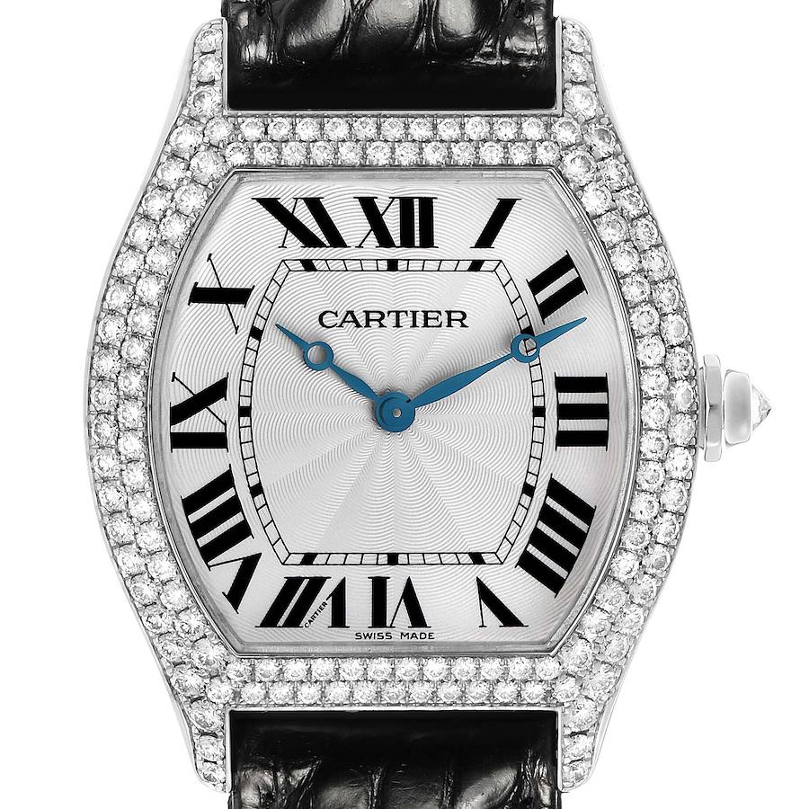 The Cartier Tortue WA504351 Men's White Gold Silver Dial watch is shown from the front, displaying its dial, Roman numerals, blued hands, and diamond-encrusted bezel.