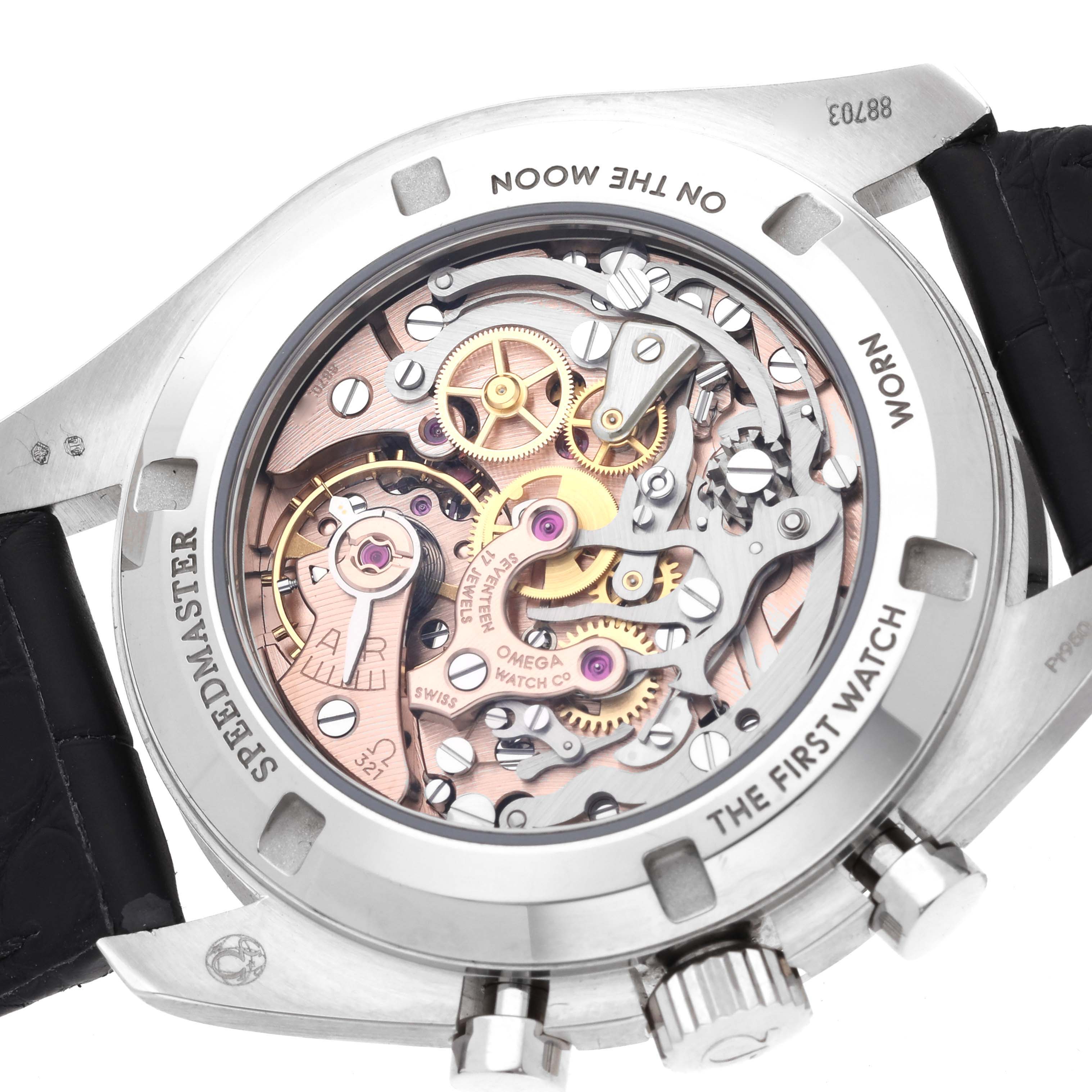 The image shows the back view of an Omega Speedmaster 311.93.42.30.99.001 Men's Platinum Black Dial 311.93.42.30.99.001 Men's Platinum Black Dial, highlighting its intricate mechanical movement.