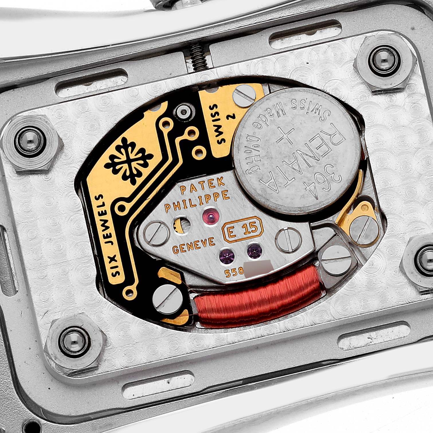 The image shows the back view of the Patek Philippe Gondolo 4972/1G-001 Women
s White Gold Mother of Pearl Dial 4972/1G-001 Women
s White Gold Mother of Pearl Dial, highlighting the movement and battery components.