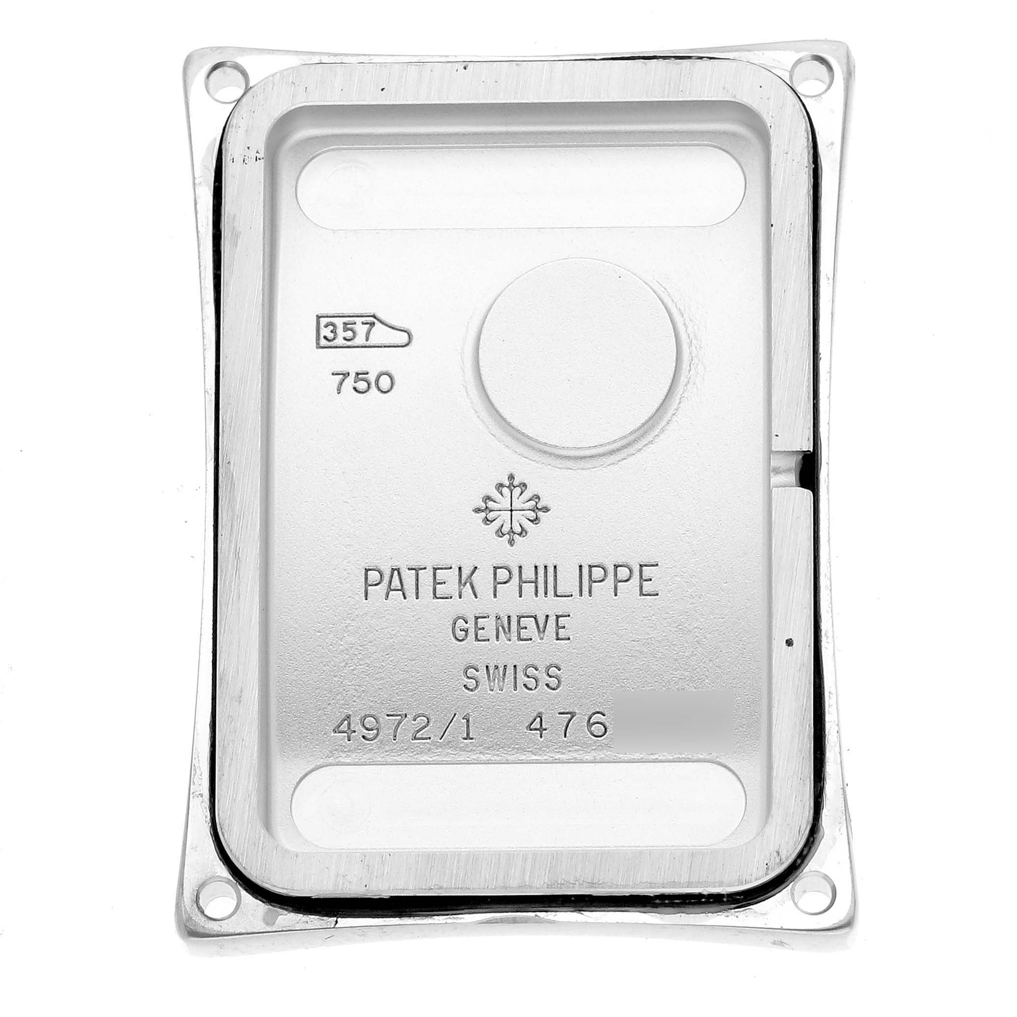 This image shows the back case of a Patek Philippe Gondolo 4972/1G-001 Women
s White Gold Mother of Pearl Dial 4972/1G-001 Women
s White Gold Mother of Pearl Dial watch from an overhead perspective.