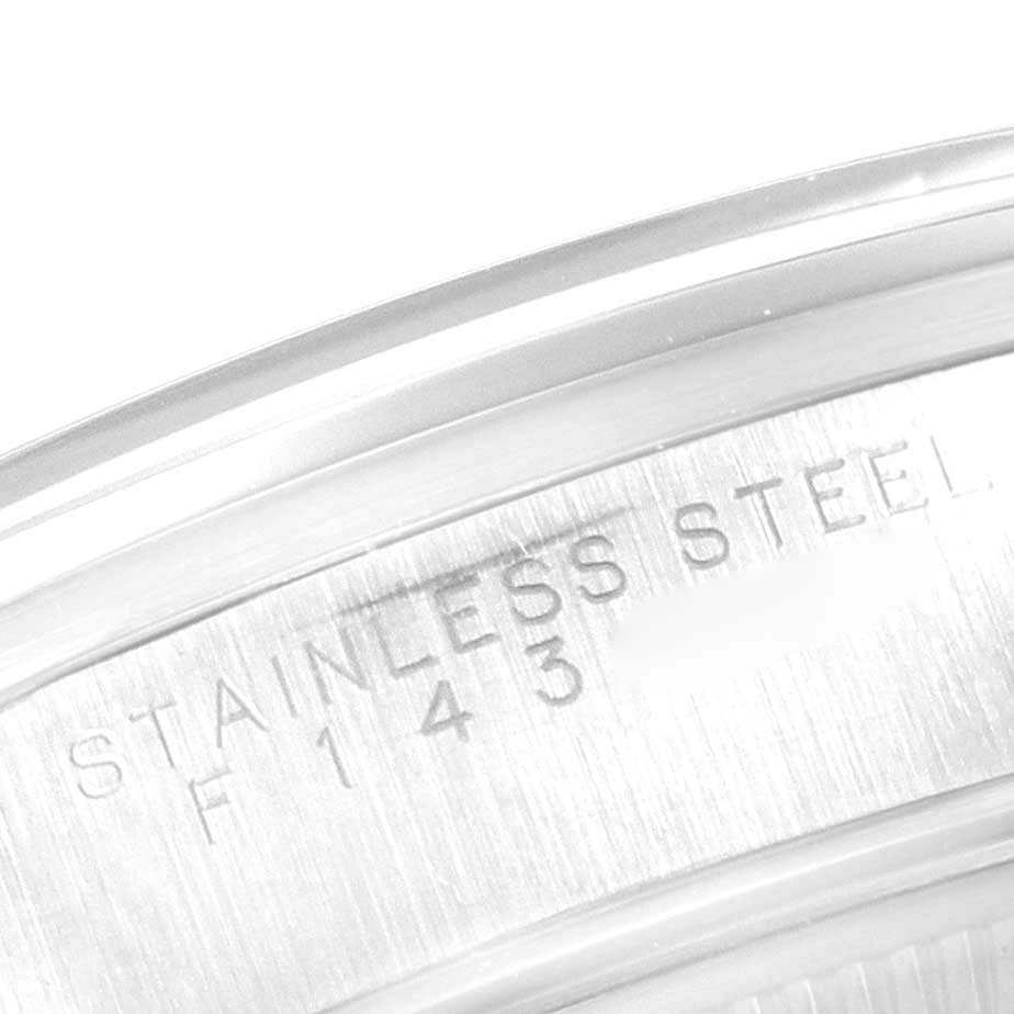 This image shows a close-up of the case back with engravings on a Rolex Air-King 14000 Men's Stainless Steel Black Dial 14000 Men's Stainless Steel Black Dial watch.