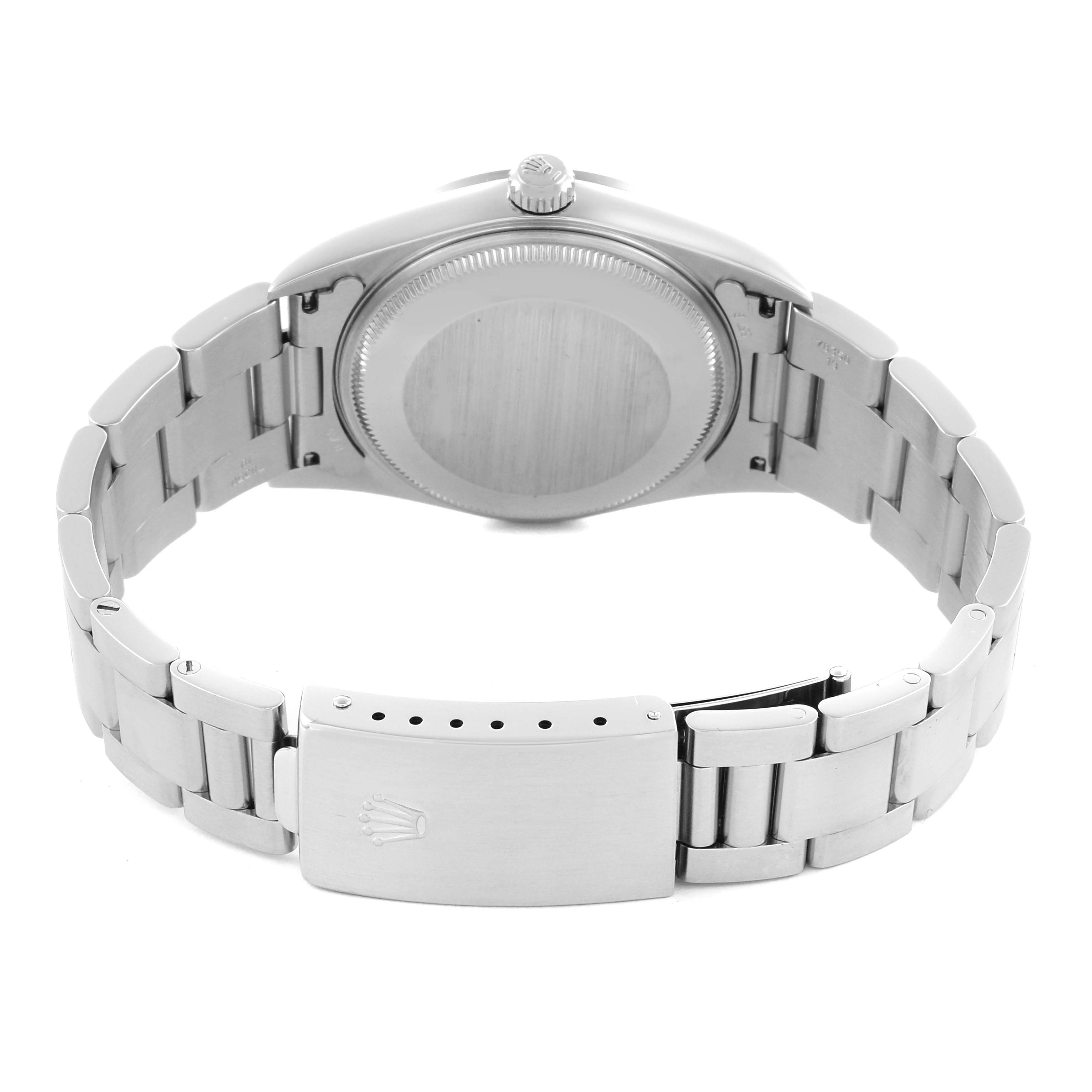 The image shows the back and clasp of a Rolex Air-King 14000M Men's Stainless Steel Black Dial 14000M Men's Stainless Steel Black Dial watch, highlighting the bracelet and case back.