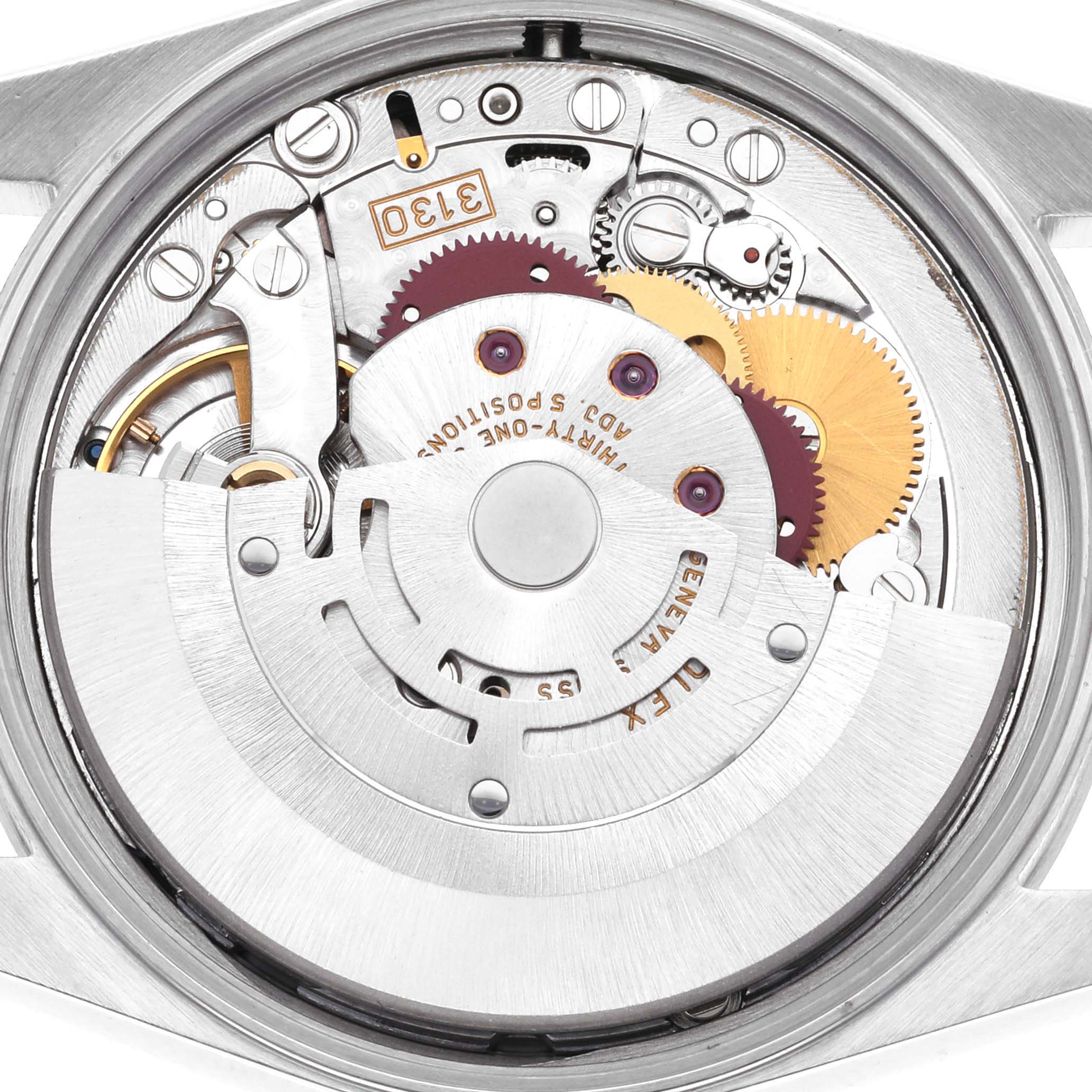 The image shows the internal mechanism of a Rolex Air-King 14000M Men's Stainless Steel Black Dial 14000M Men's Stainless Steel Black Dial watch from a top-down angle, displaying gears and components.