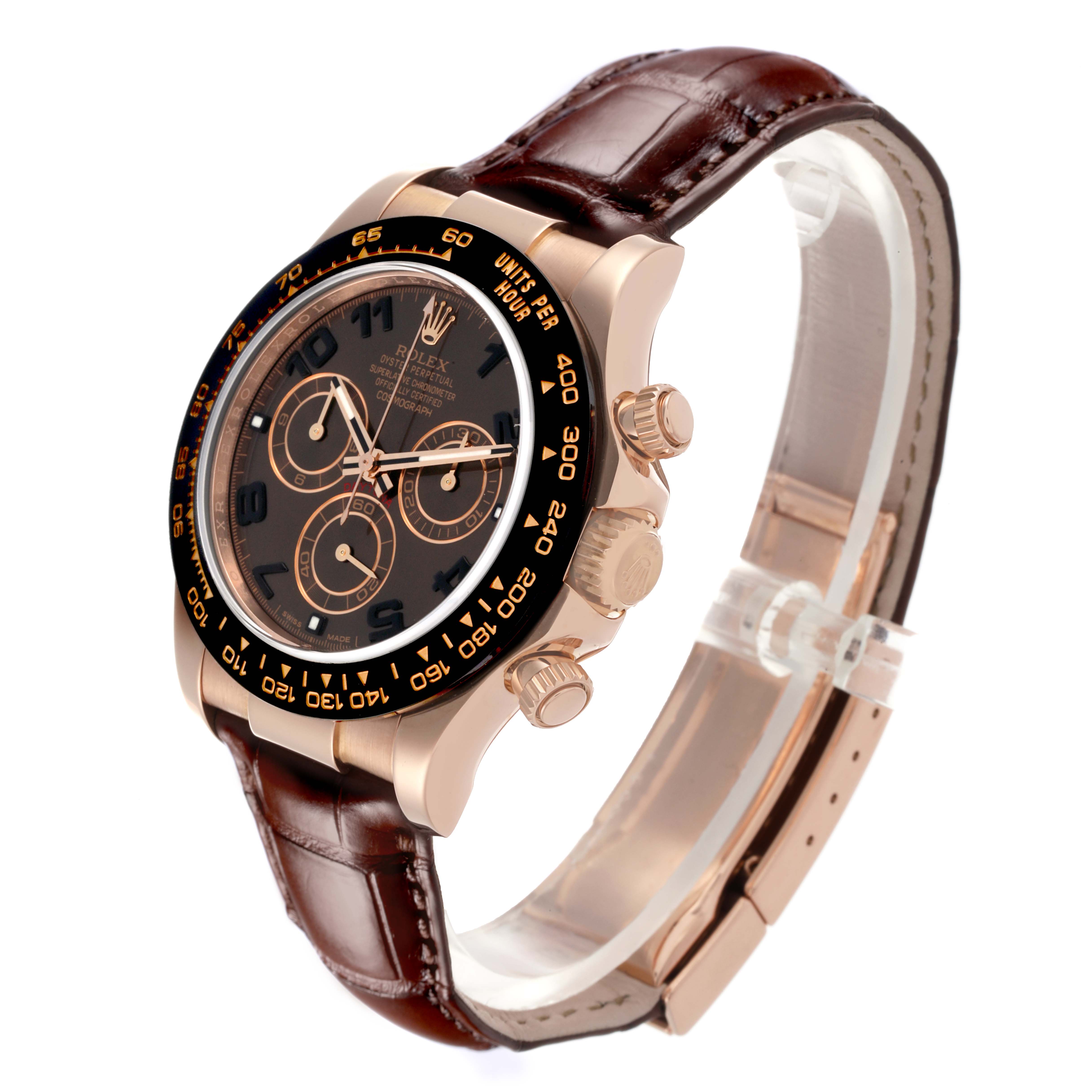 The Rolex Daytona 116515LN Men's Rose Gold Brown Dial 116515LN Men's Rose Gold Brown Dial watch is shown at an angle highlighting the face, crown, pushers, and leather strap.