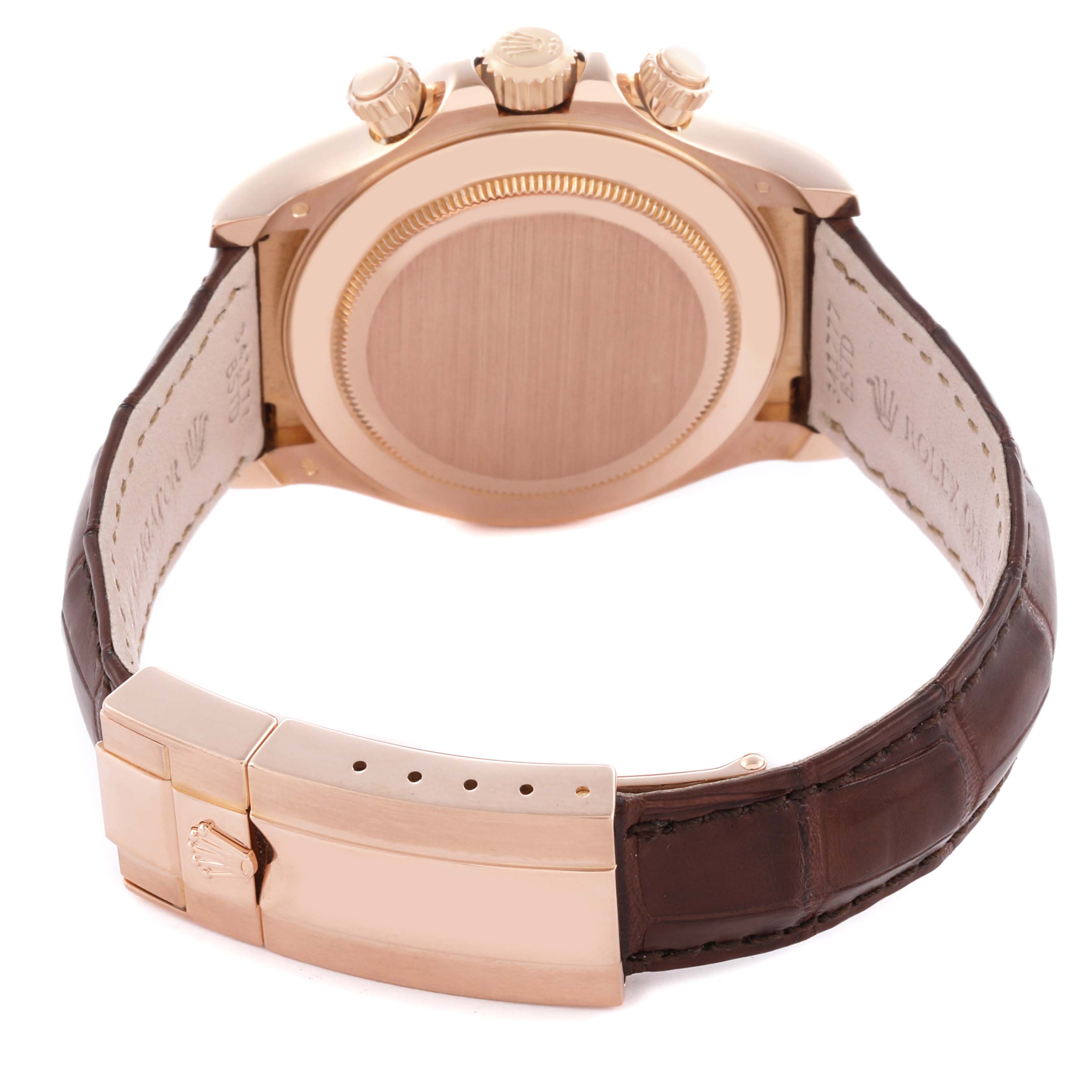 The image shows the back of a Rolex Daytona 116515LN Men's Rose Gold Brown Dial 116515LN Men's Rose Gold Brown Dial, highlighting the case back and leather strap with a gold clasp.