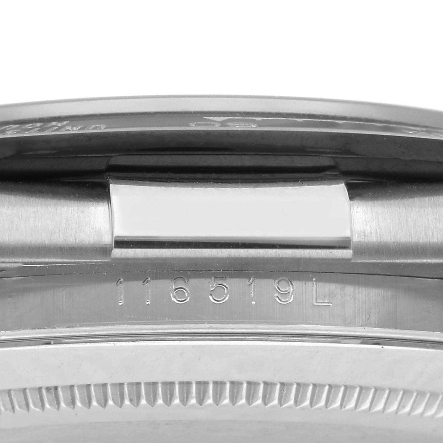 The image shows a side view of the casing and the serial number on the flank of a Rolex Daytona 116519LN Men's White Gold Mother of Pearl Dial 116519LN Men's White Gold Mother of Pearl Dial watch.