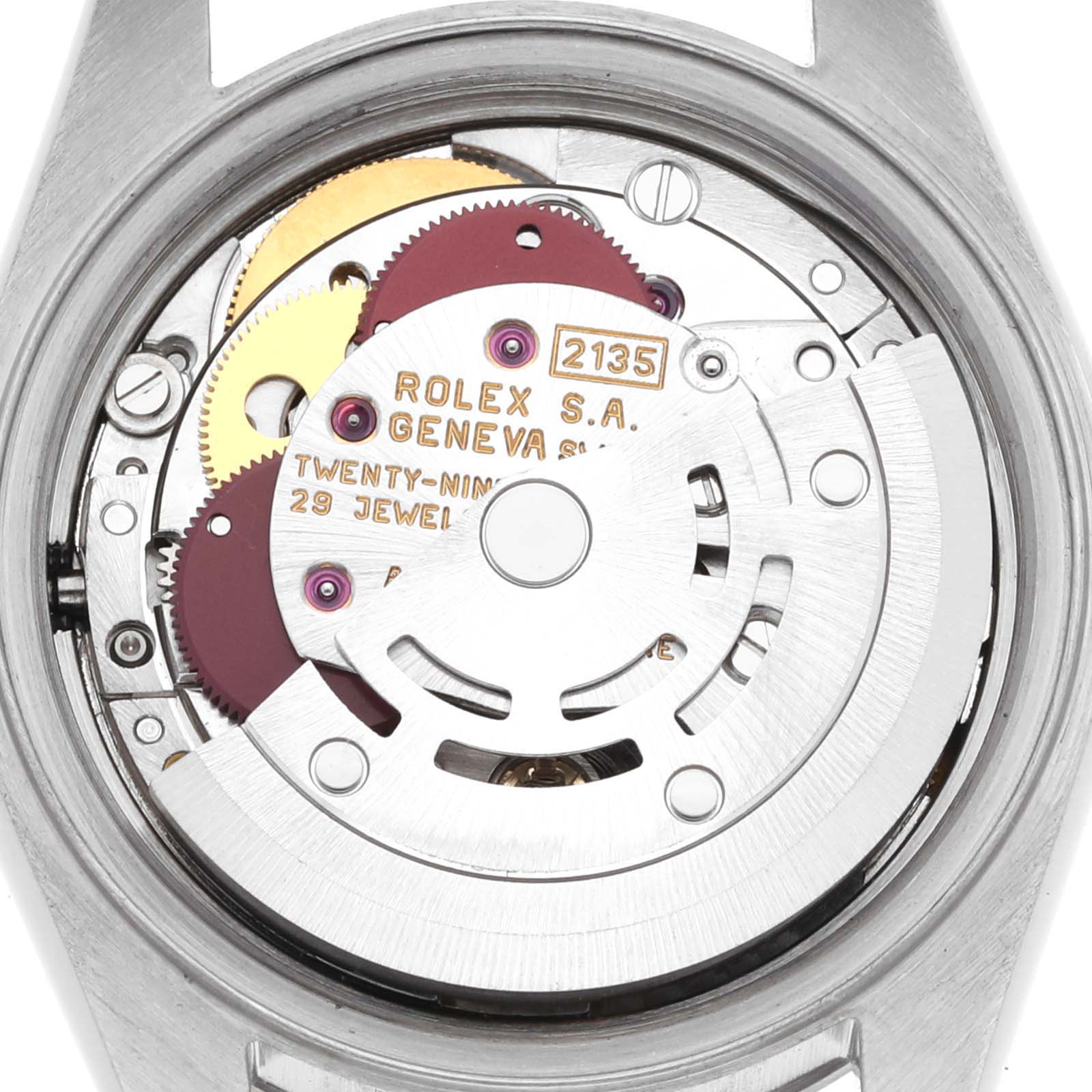 The image shows the internal movement of a Rolex Date 69240 Women's Stainless Steel Blue Dial 69240 Women's Stainless Steel Blue Dial watch from a back angle, highlighting gears and mechanisms.