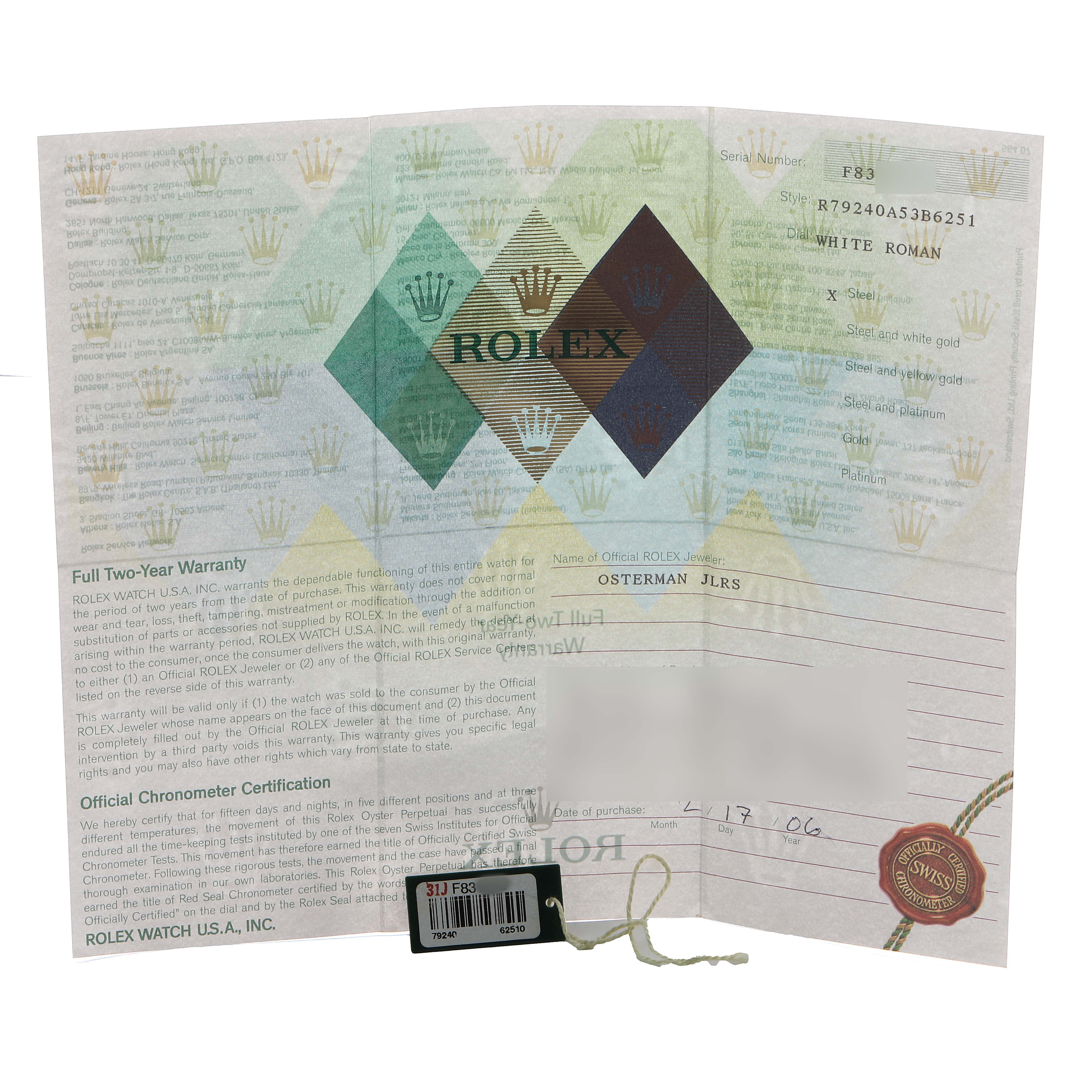 The image shows Rolex Date 79240 Women's Stainless Steel White Dial model paperwork and a tag, viewed from above.