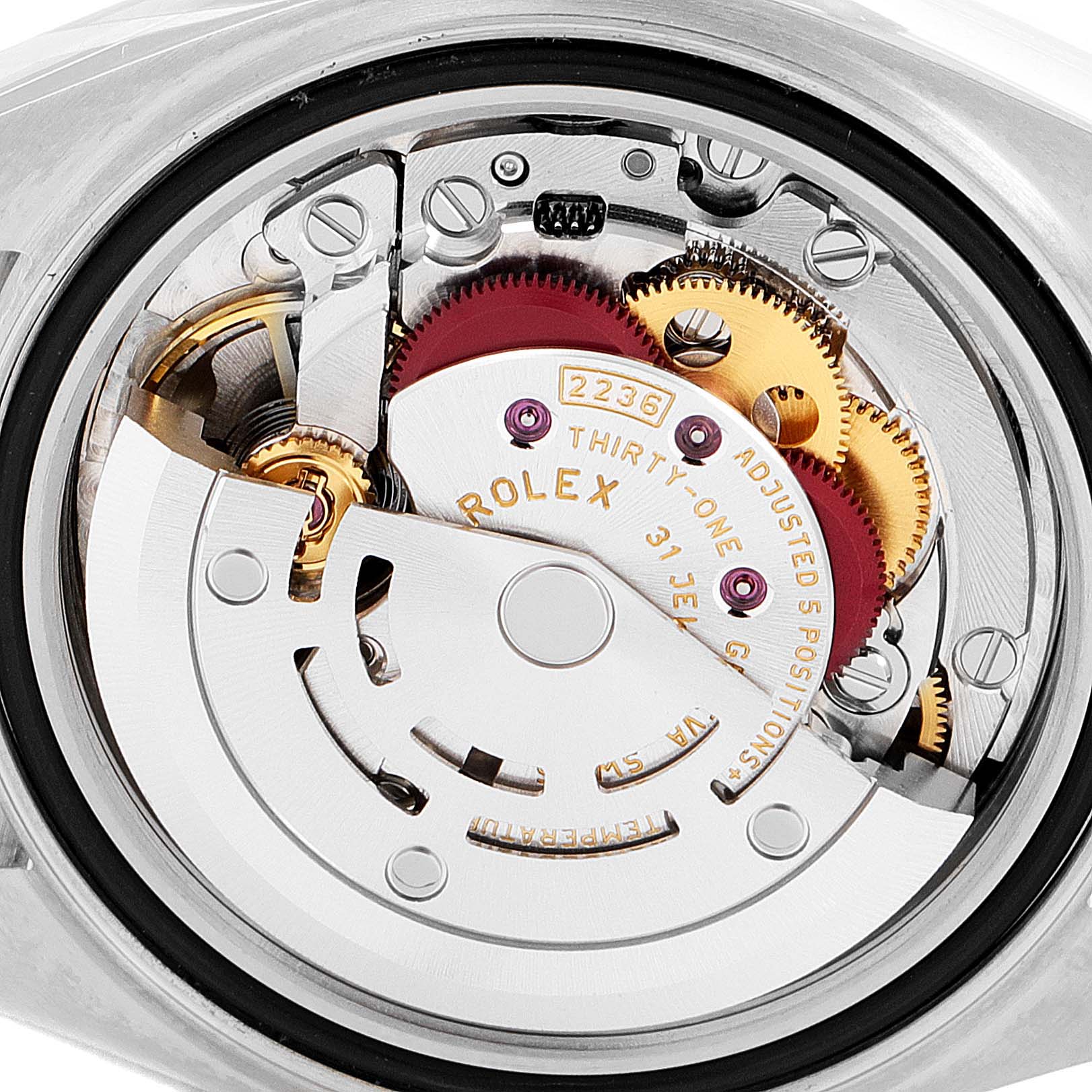 This image shows the internal mechanical movement of a Rolex Datejust 279173 Women
s Steel and Gold (two tone) Green Dial 279173 Women
s Steel and Gold (two tone) Green Dial watch from a rear angle.